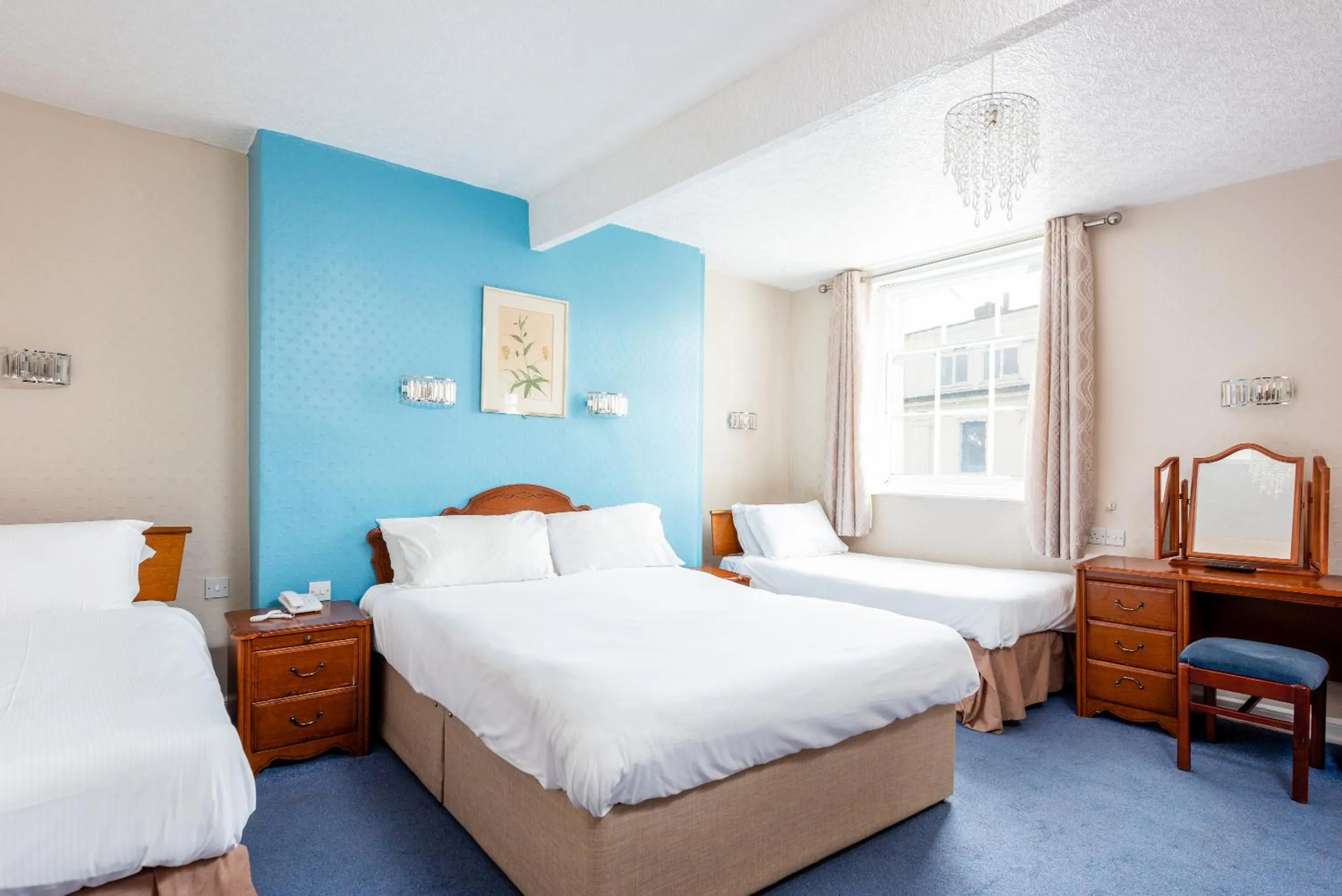 Bed in The Esplanade Hotel