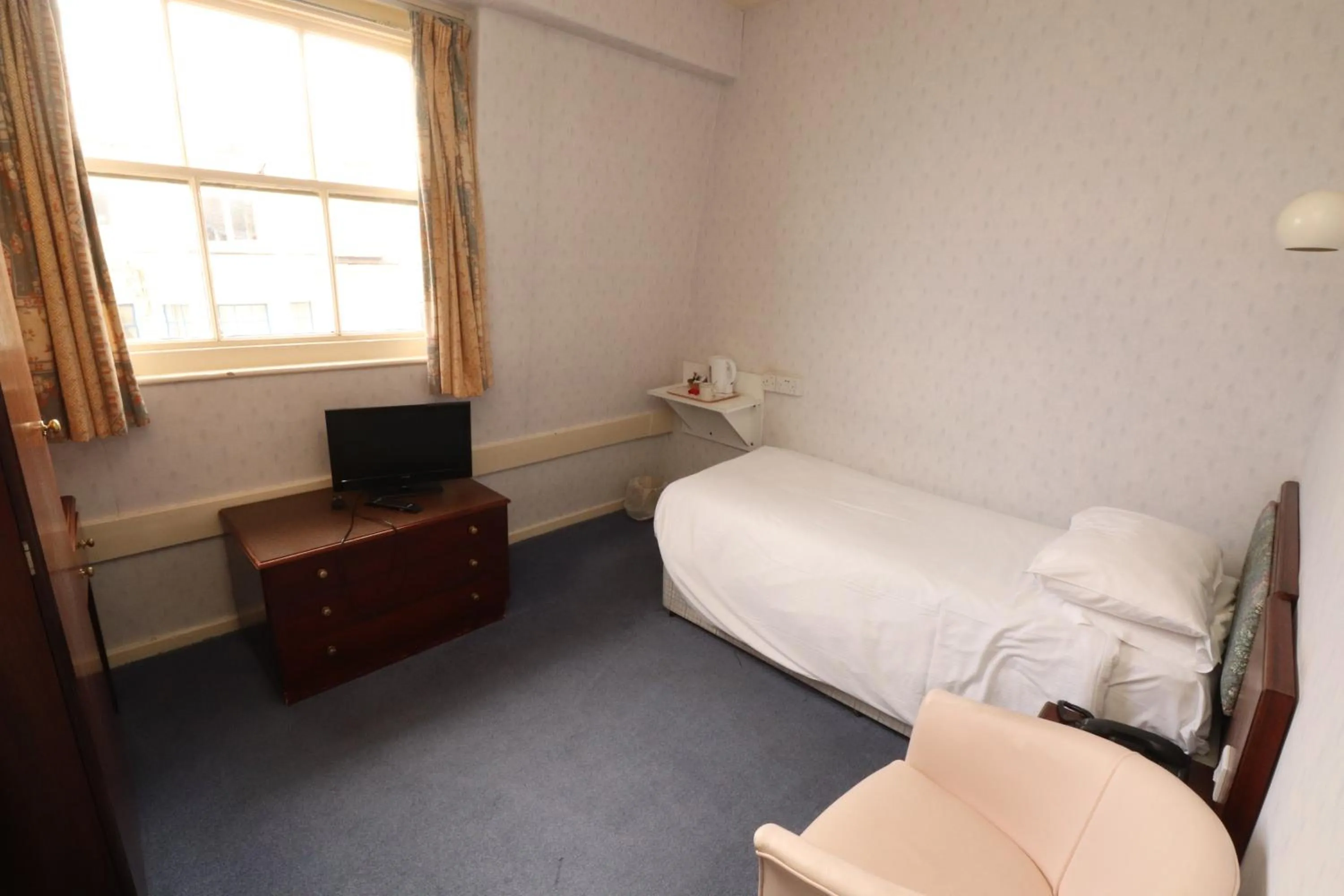 Photo of the whole room, Bed in The Esplanade Hotel