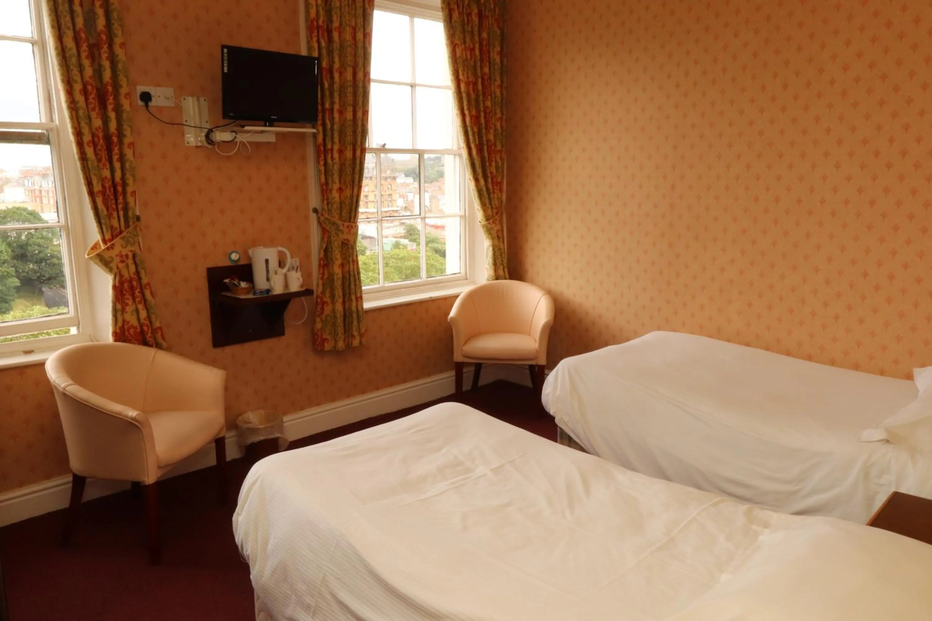 Photo of the whole room, Bed in The Esplanade Hotel