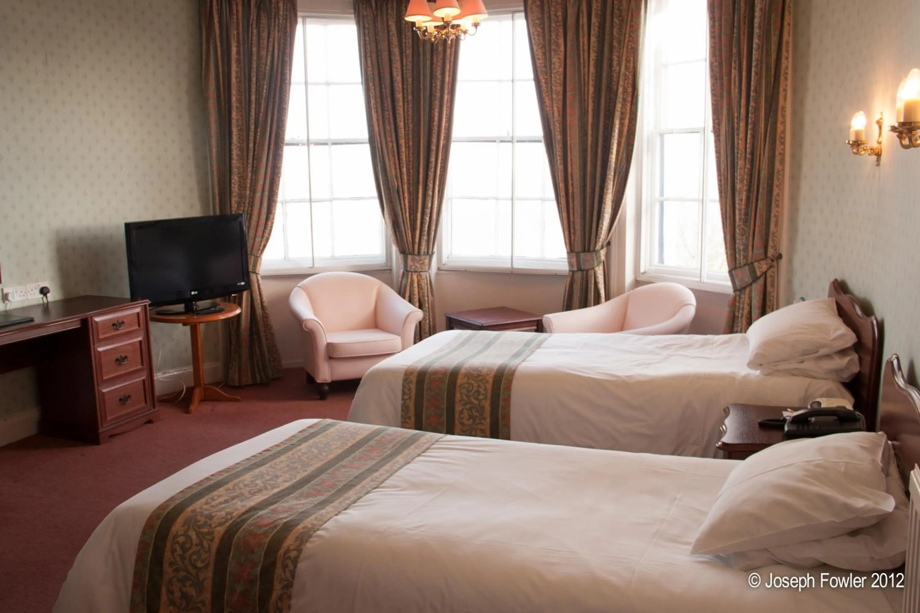 Bathroom, Bed in The Esplanade Hotel