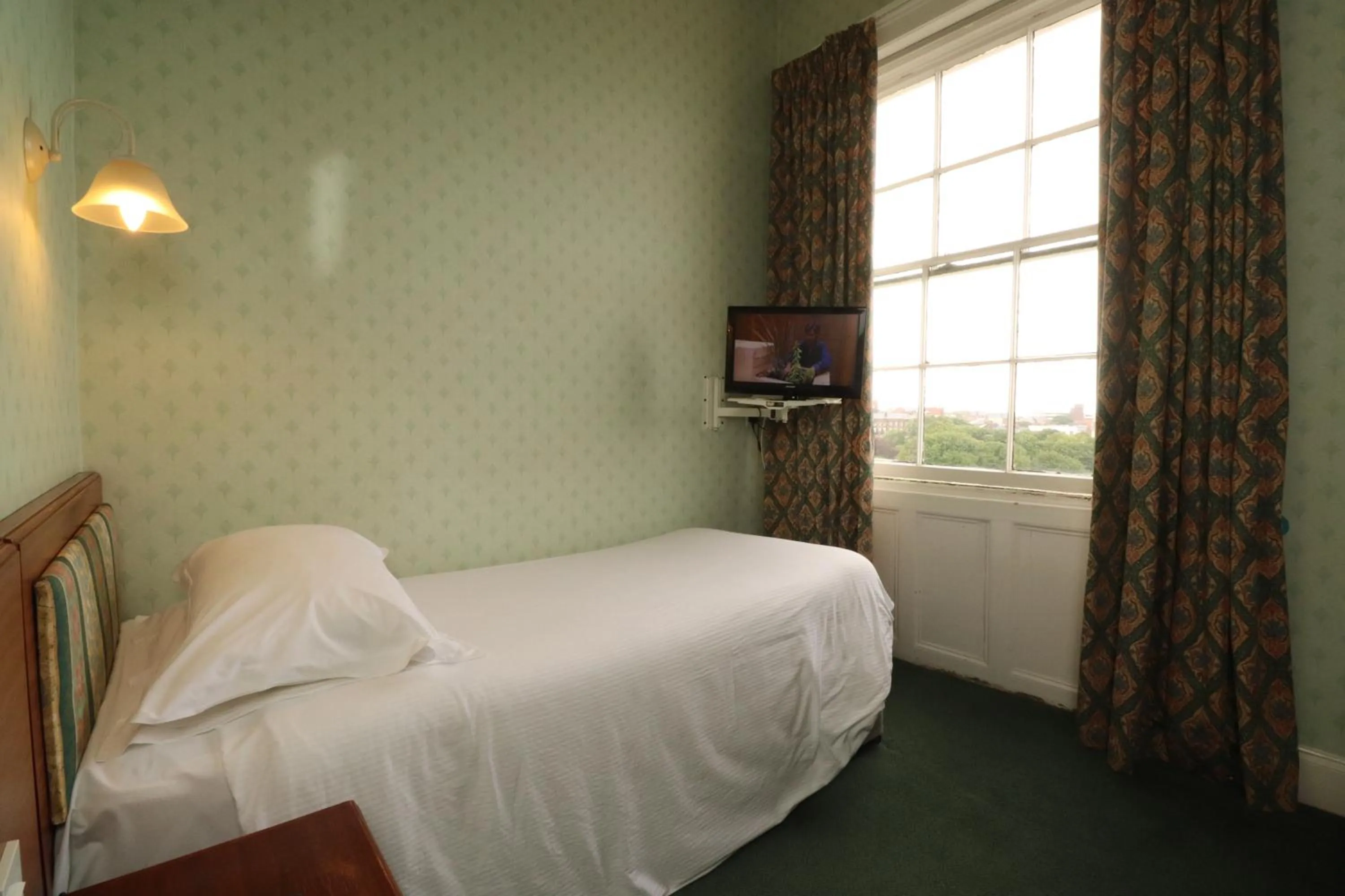 Photo of the whole room, Bed in The Esplanade Hotel