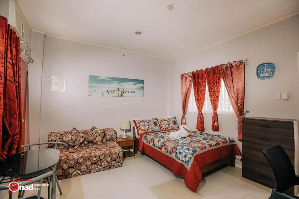 Bedroom, Bed in Ashley and Bill's Suites 'N Garden Hotel and Vacation Homes