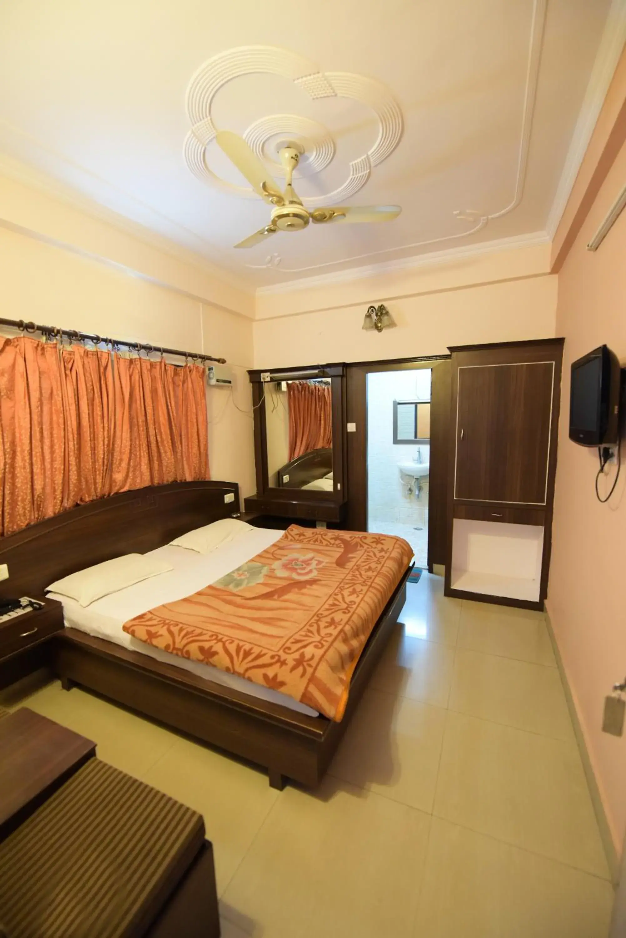 Deluxe Room (2 Adults + 1 Child) in Hotel Ganga Vilas Deluxe Room (2 Adults + 1 Child) in Hotel Ganga Vilas
