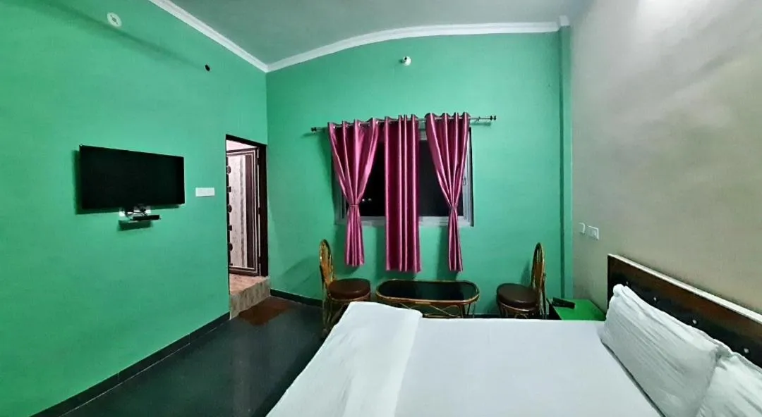 Photo of the whole room, Bed in Nandini Homestay