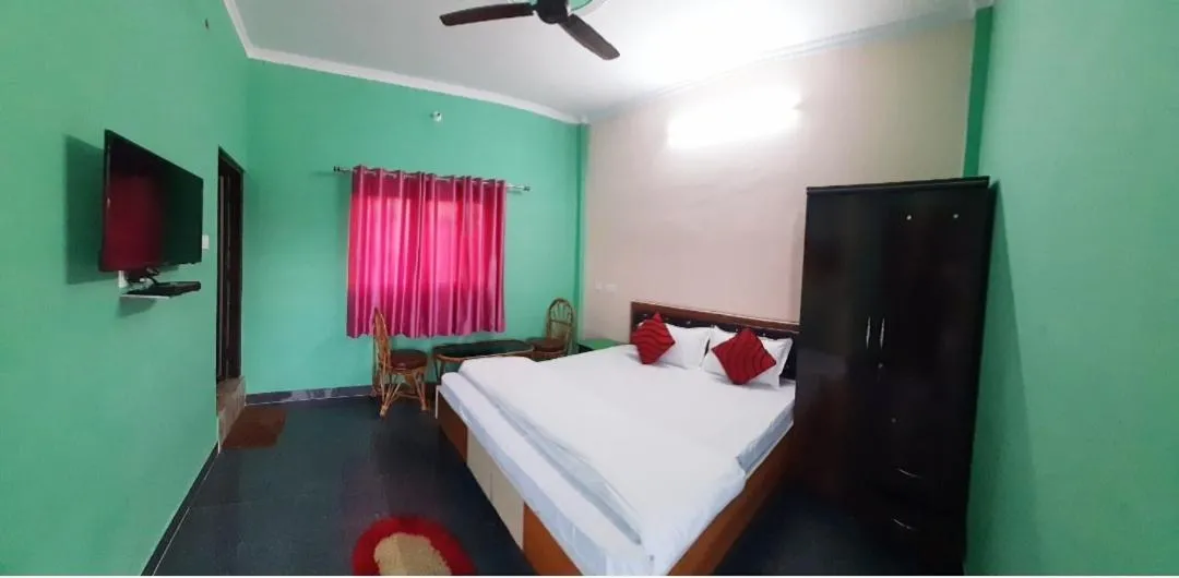 Photo of the whole room, Bed in Nandini Homestay
