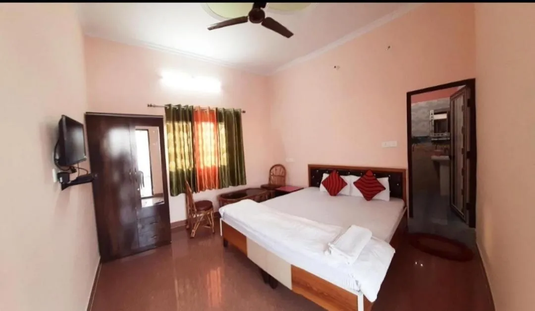 Bed in Nandini Homestay