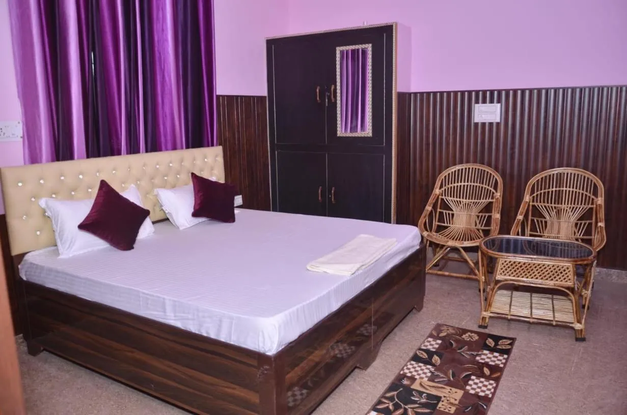 Photo of the whole room, Bed in Nandini Homestay