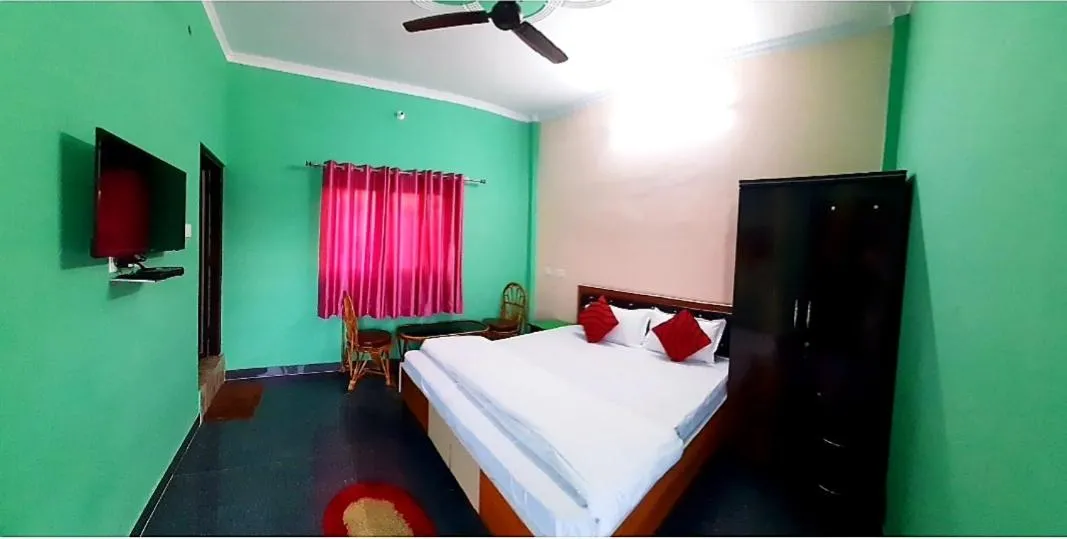 Photo of the whole room, Bed in Nandini Homestay
