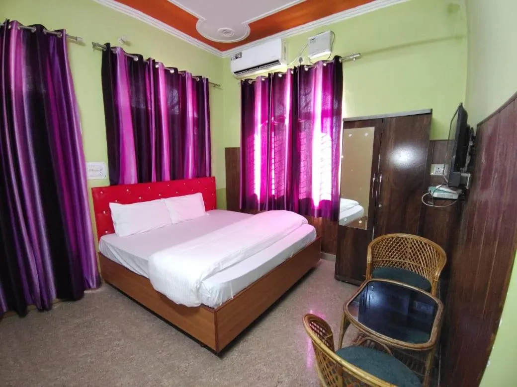 Bed in Nandini Homestay