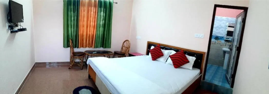 Photo of the whole room, Bed in Nandini Homestay