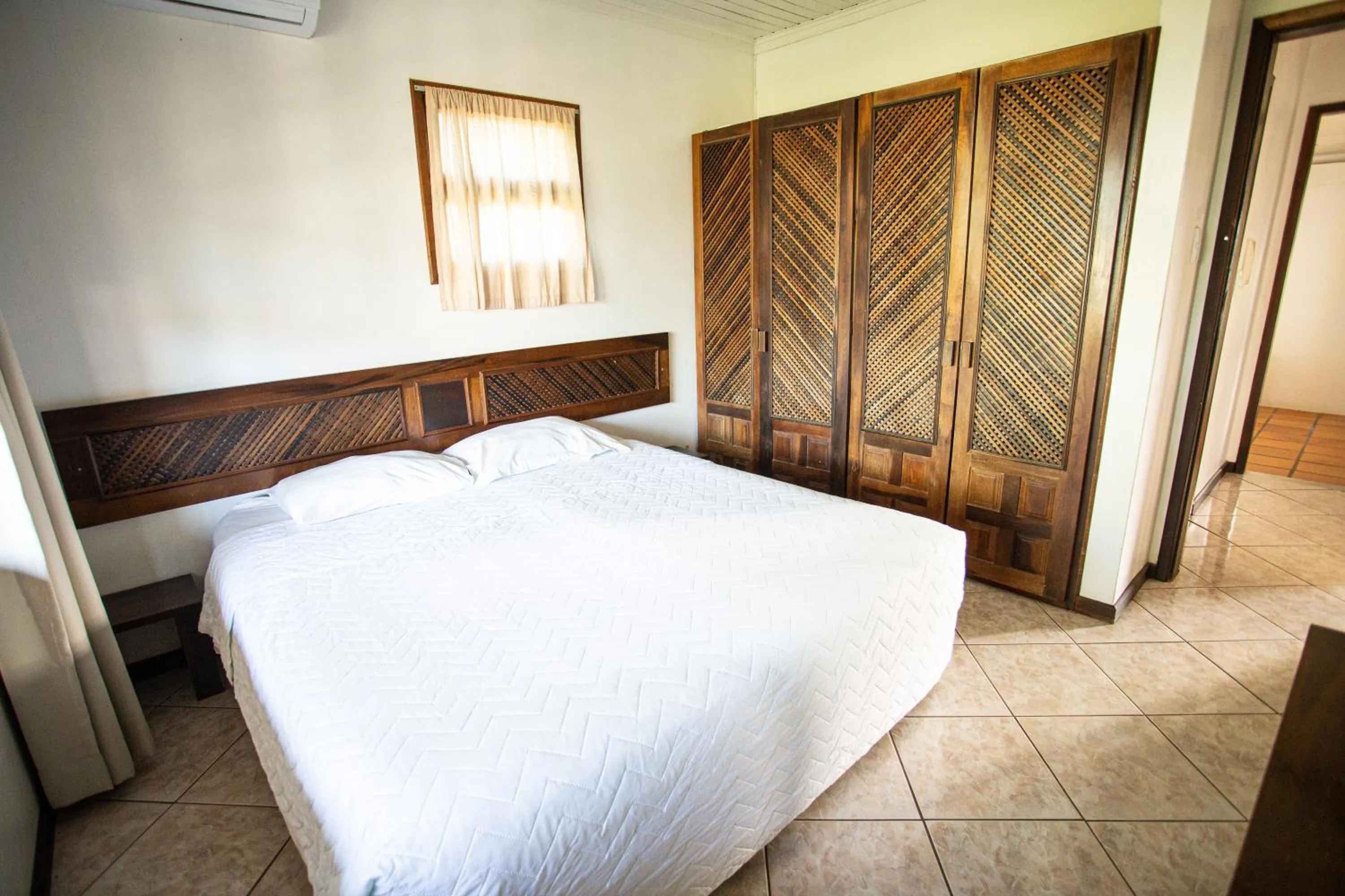 Photo of the whole room, Bed in Pousada Cabanas da Praia Mole