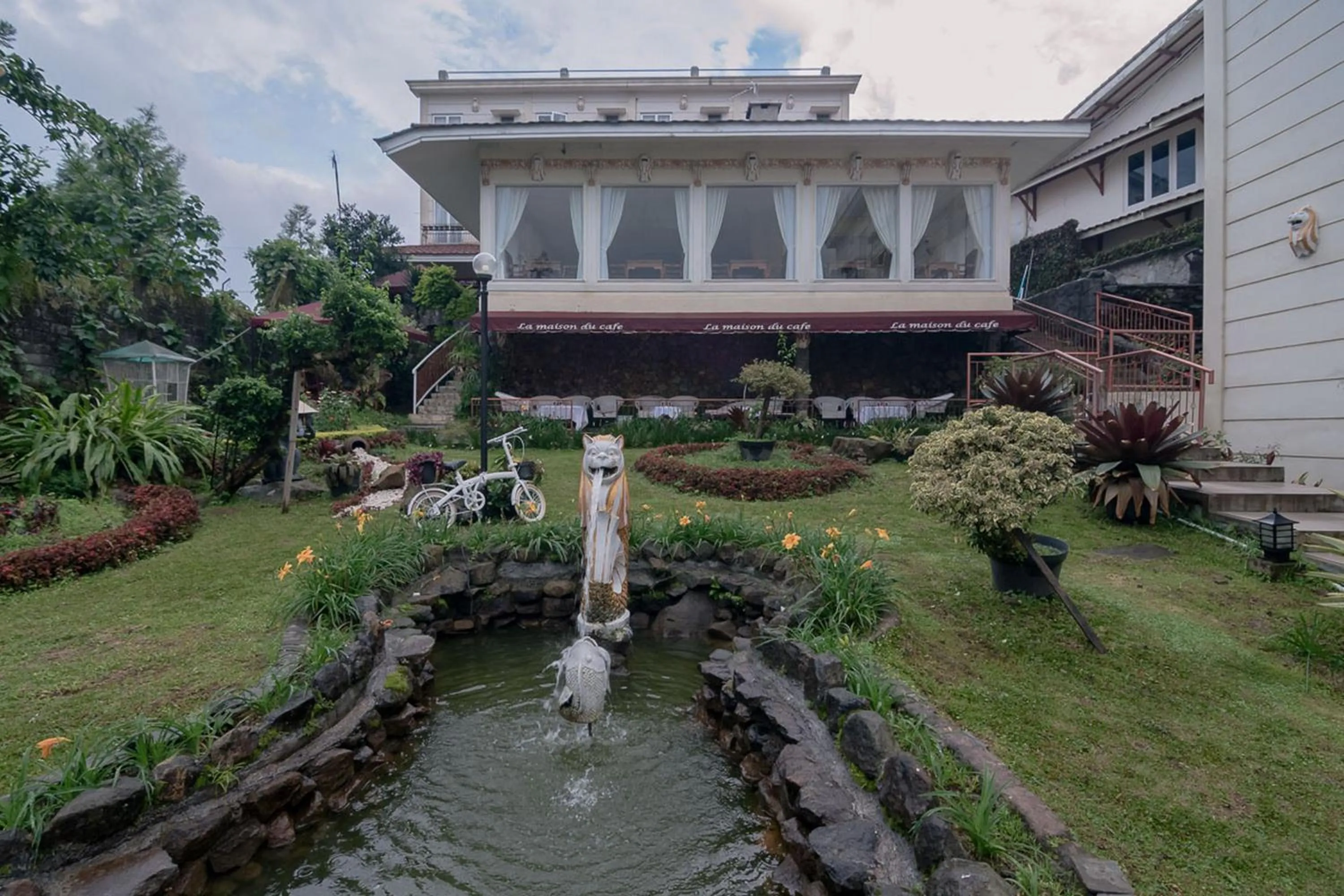 Garden view in Urbanview Hotel Mon Bel Cibodas by RedDoorz