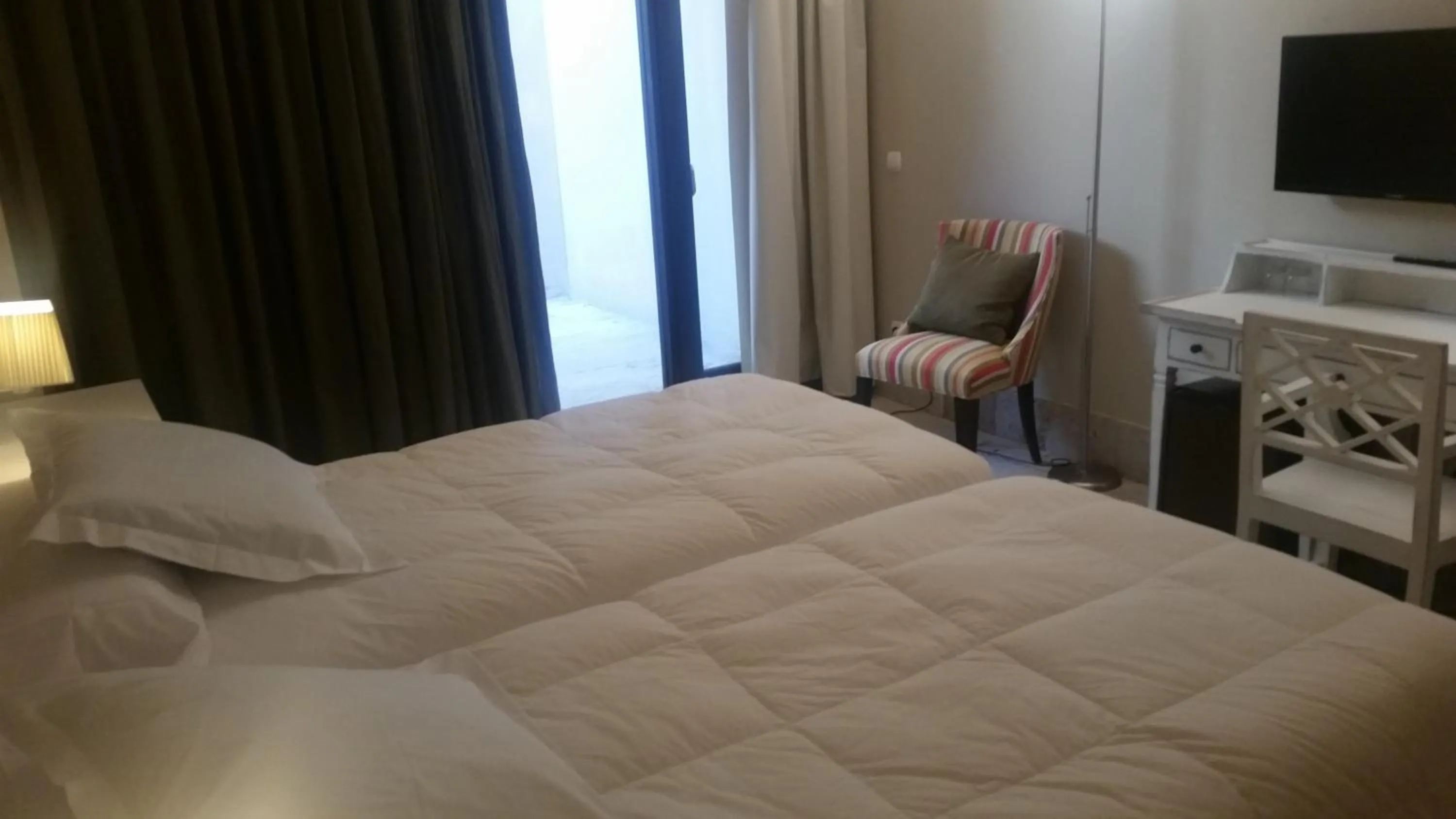 Bed in Hotel Palacio de Mengibar