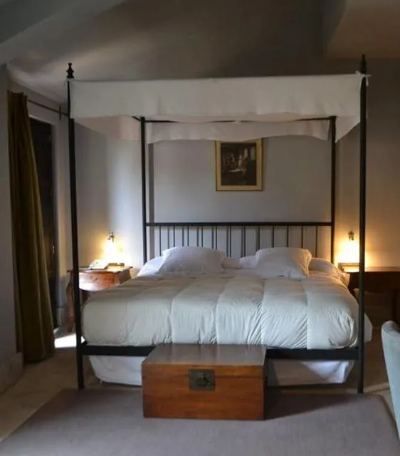 Bed in Hotel Palacio de Mengibar