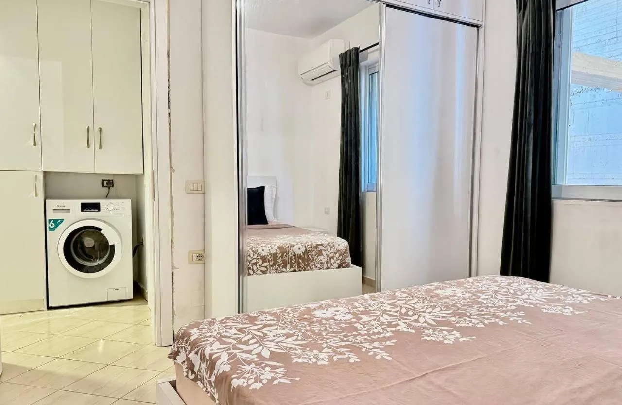 Bed in Sail View Boutique Apartment