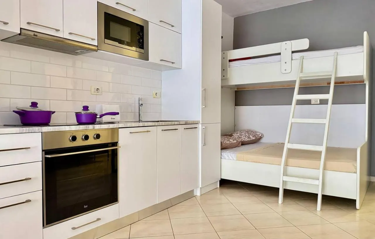 Bed in Sail View Boutique Apartment