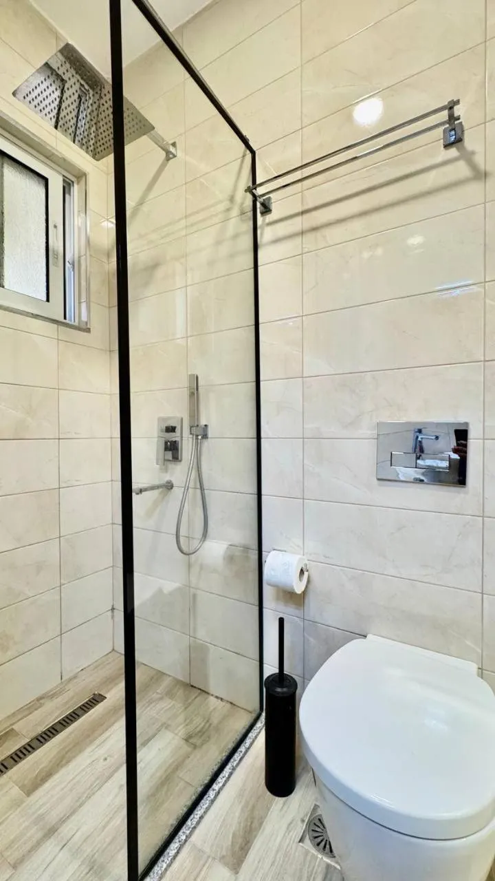 Shower in Sail View Boutique Apartment
