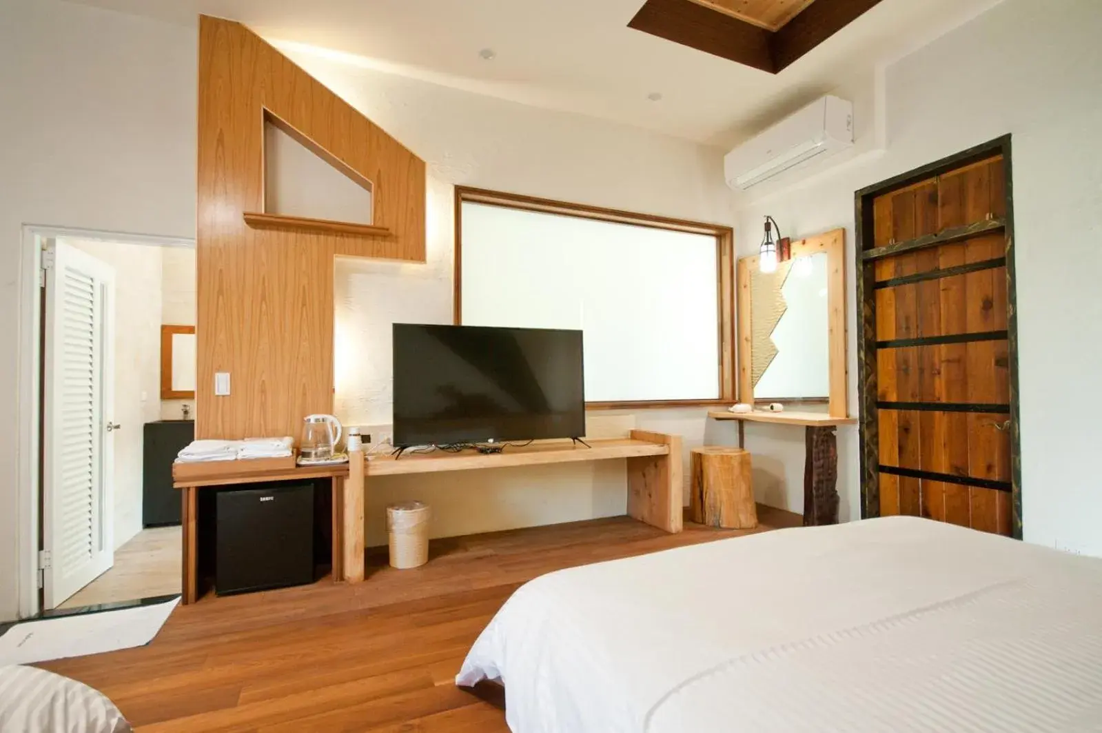 Bed in 春陽溫泉一品居 ChunYang Homestay hot spring Bed in 春陽溫泉一品居 ChunYang Homestay hot spring