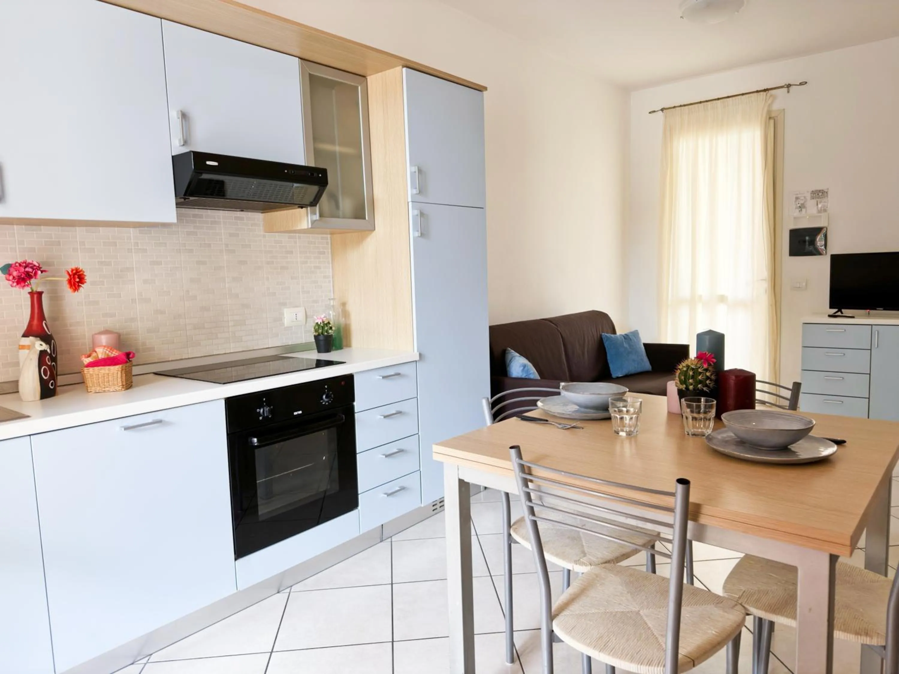 Kitchen or kitchenette in Airone Bianco Residence Village