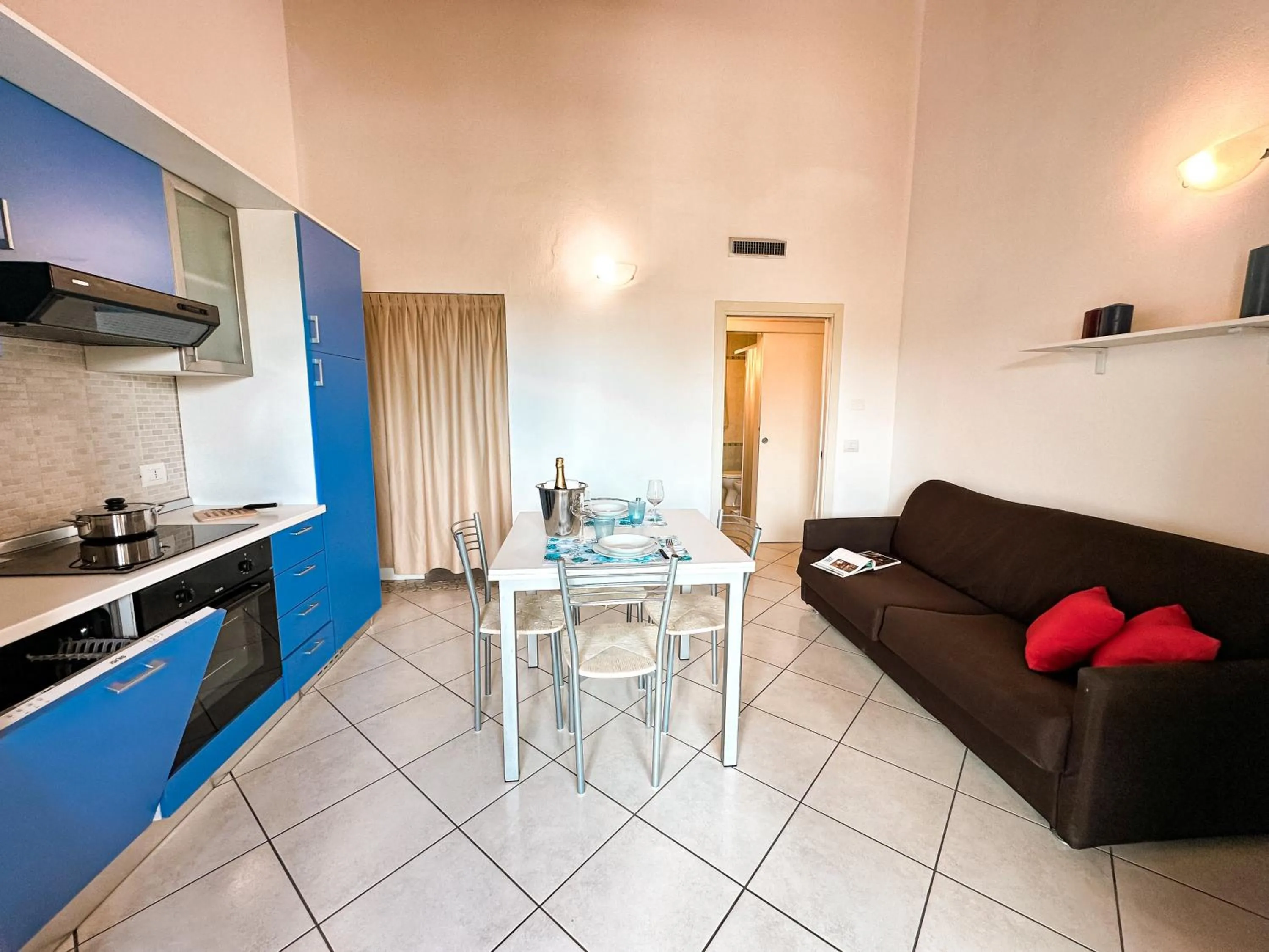 Kitchen or kitchenette in Airone Bianco Residence Village