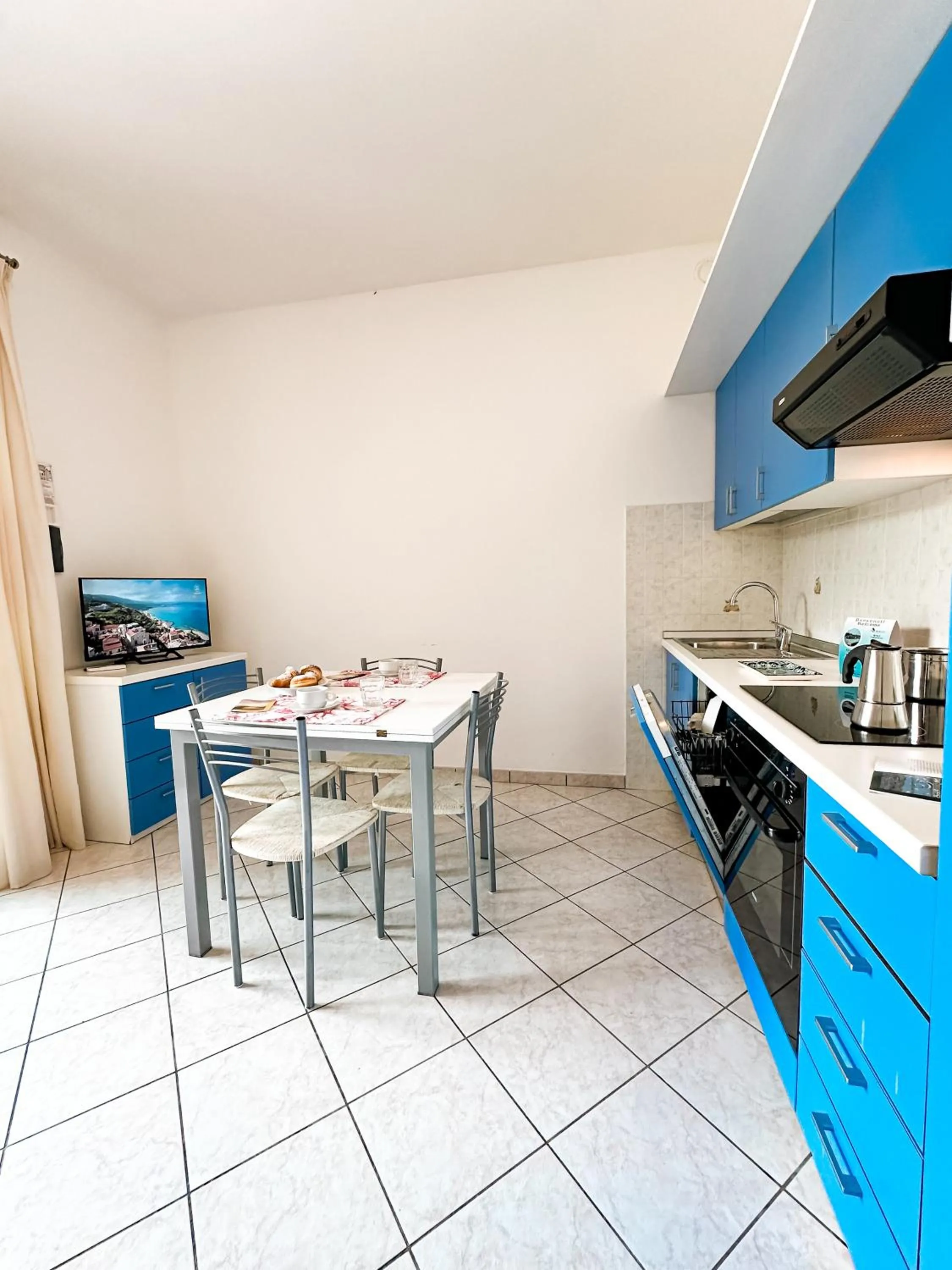 Kitchen or kitchenette in Airone Bianco Residence Village