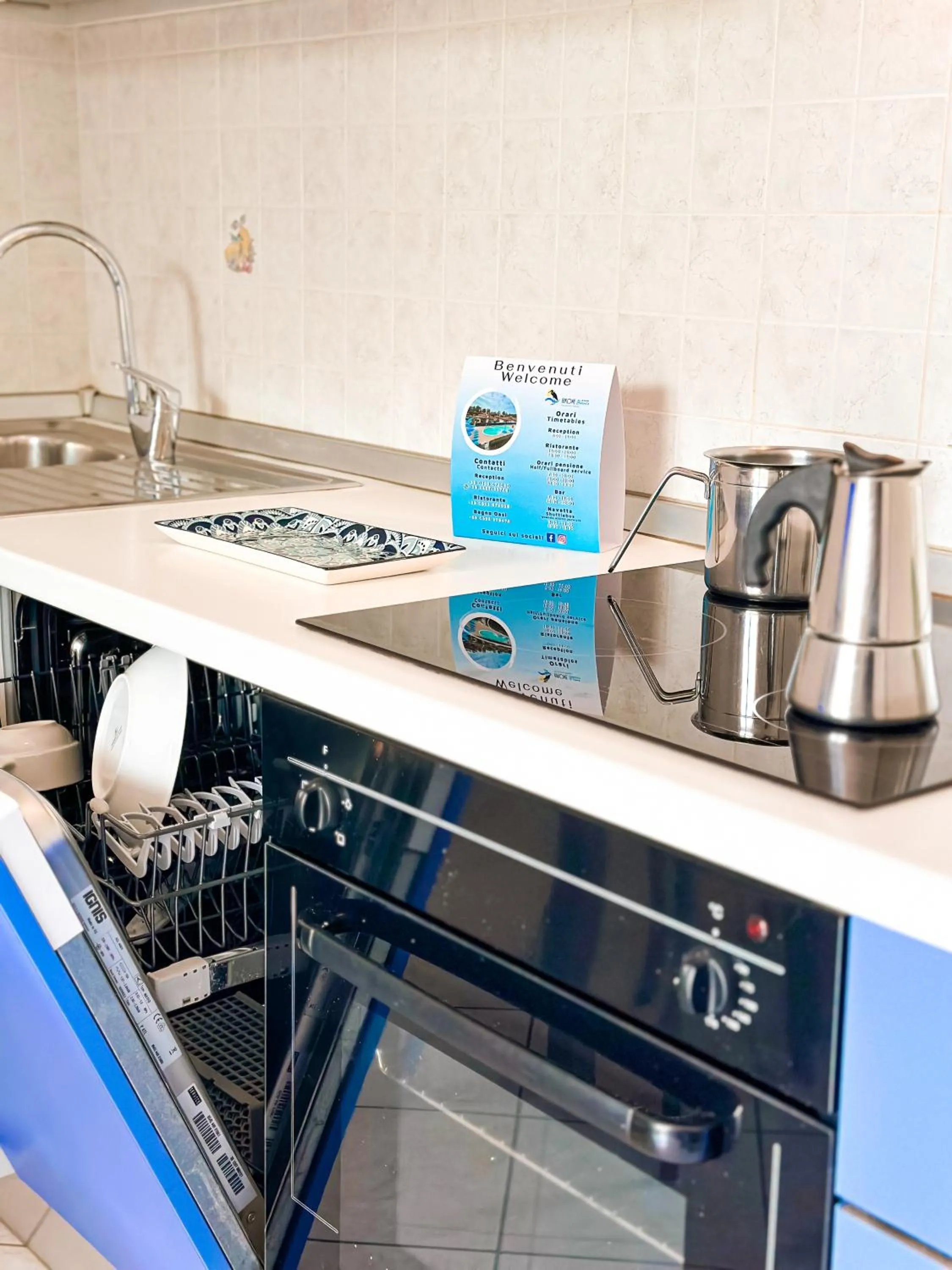 Kitchen or kitchenette in Airone Bianco Residence Village