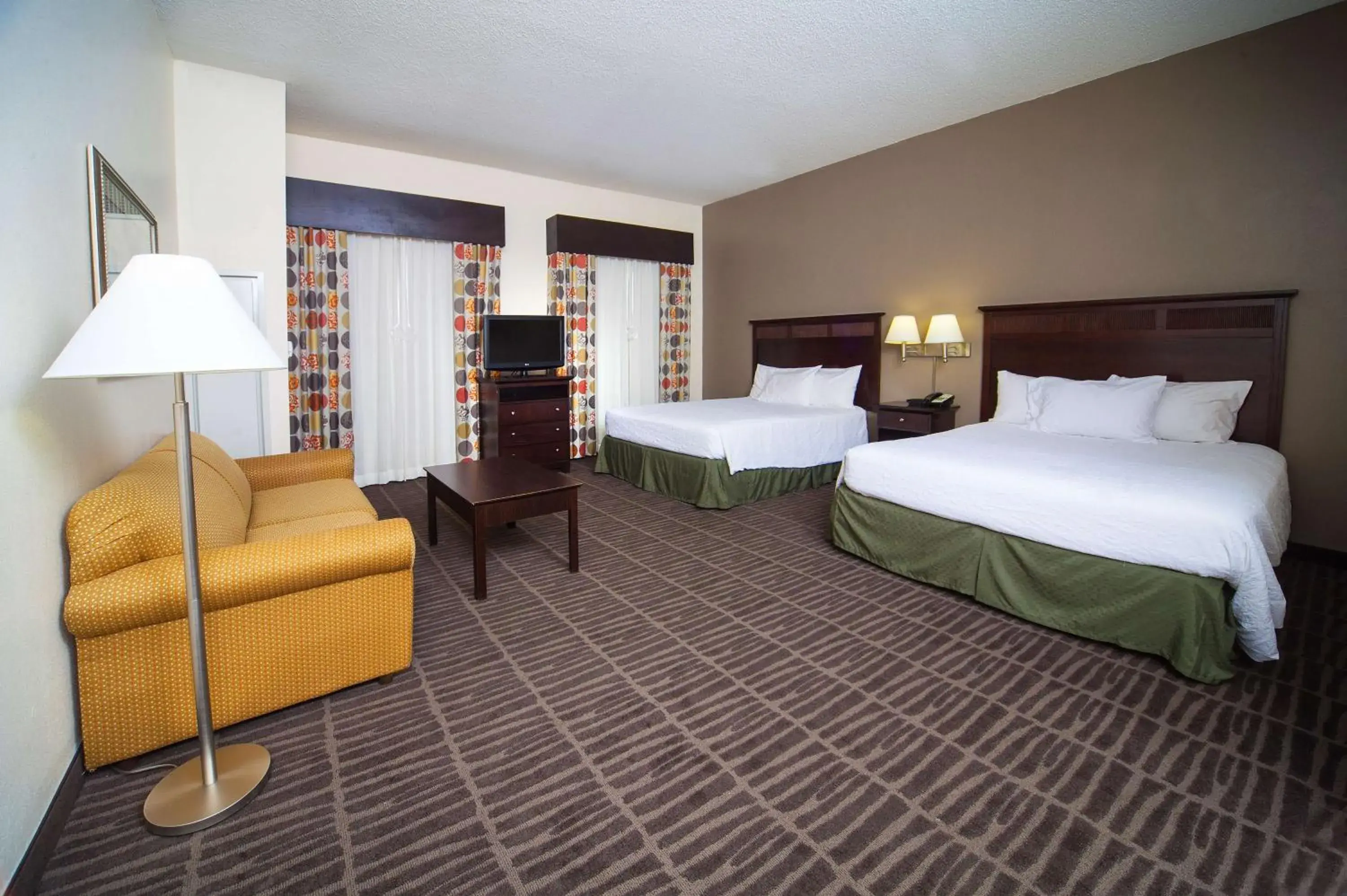 Bed in Hampton Inn & Suites Valdosta/Conference Center Bed in Hampton Inn & Suites Valdosta/Conference Center