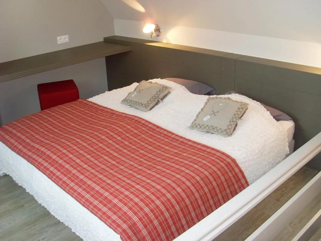 Bed in Gîtes et chambres d'hôtes Maison Ungerer