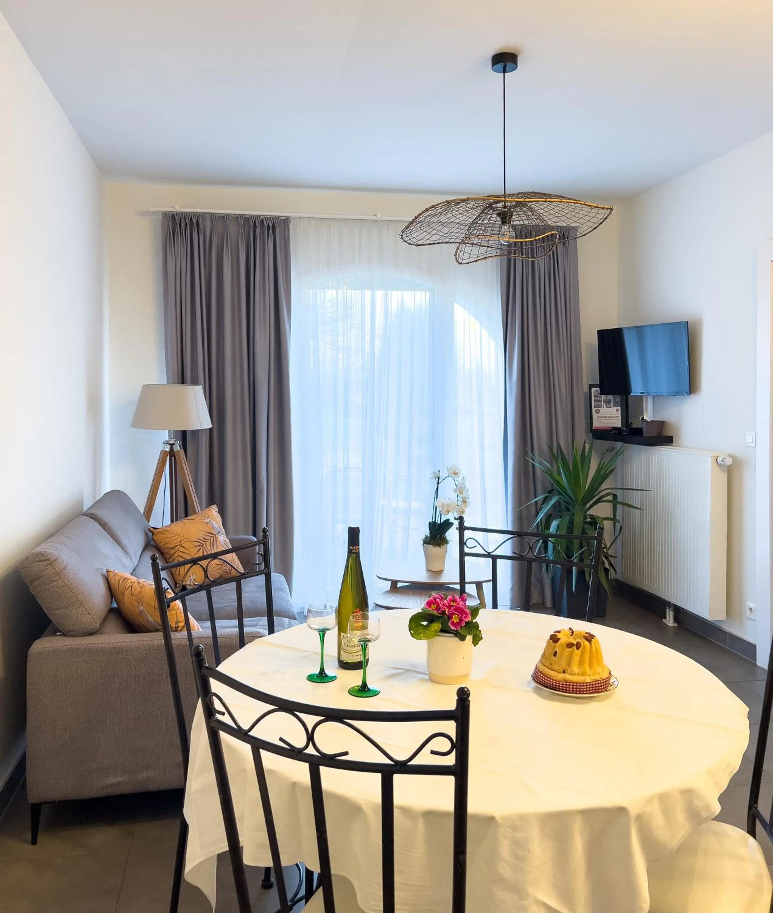 Communal lounge/ TV room in Gîtes et chambres d'hôtes Maison Ungerer