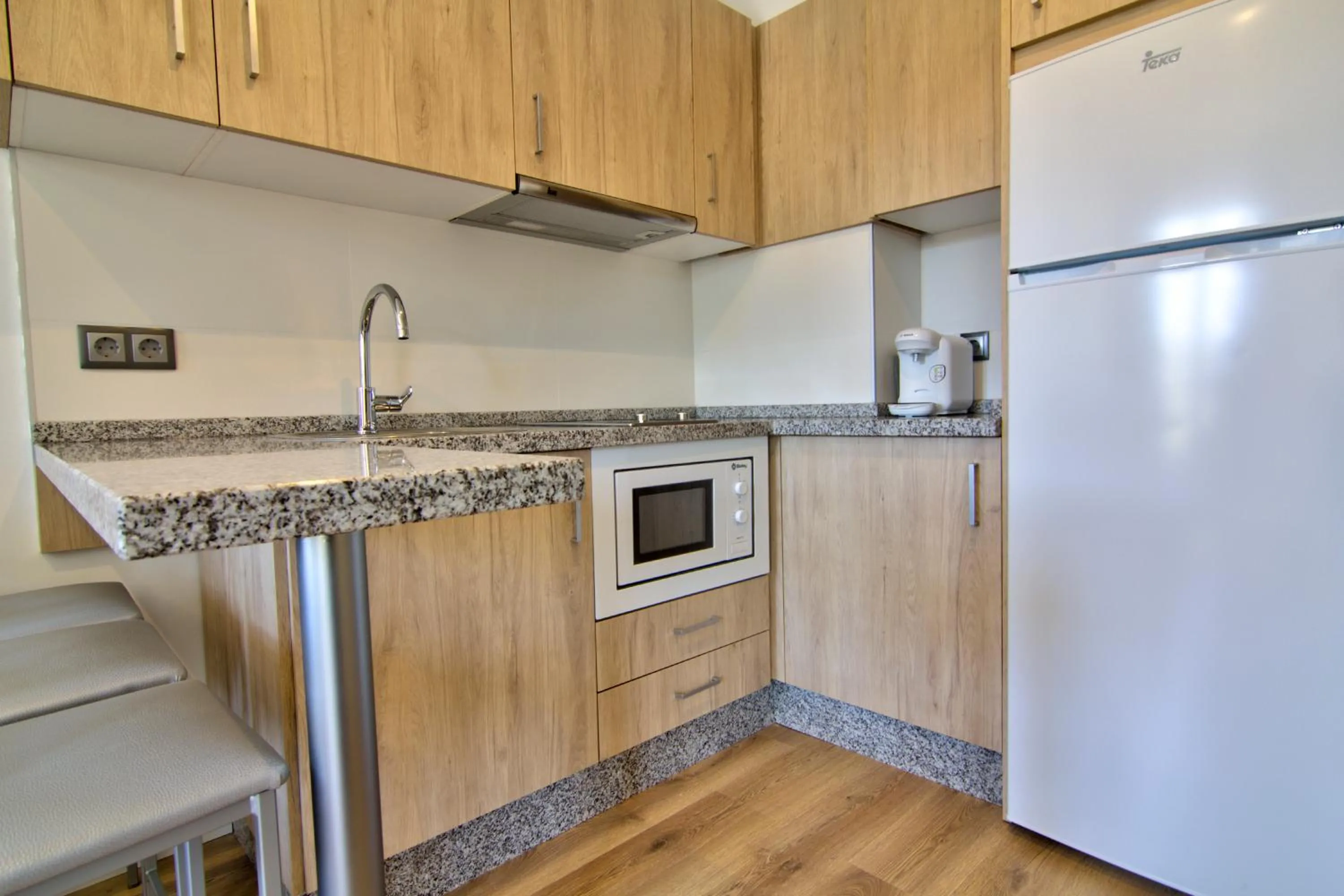 Kitchen or kitchenette in Apartamentos Arenal