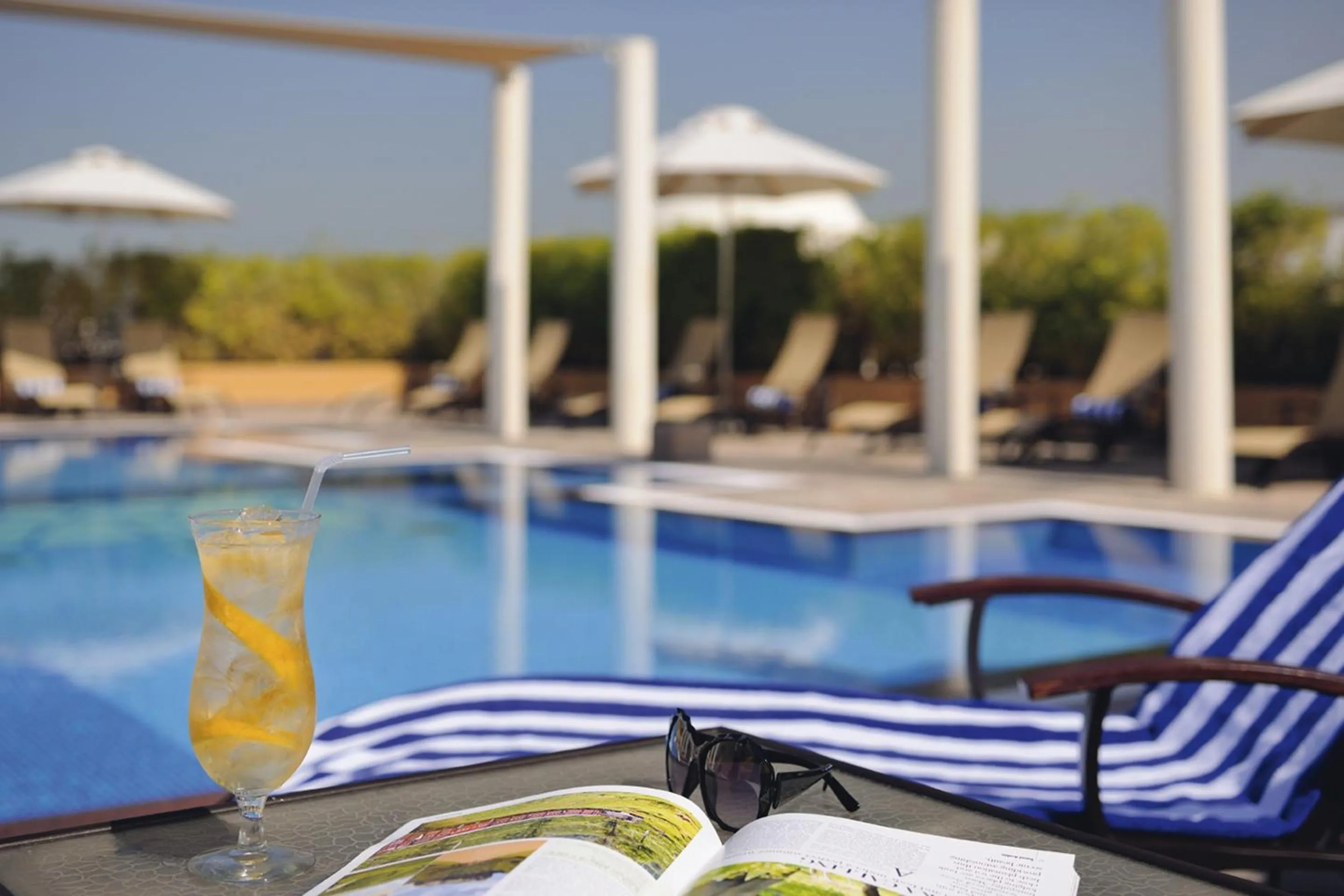 Swimming pool in Mövenpick Hotel Apartments Al Mamzar Dubai