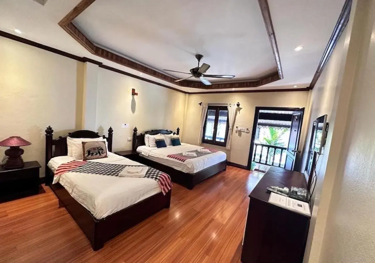 Superior Triple Room in Y Not Lao Villa Superior Triple Room in Y Not Lao Villa