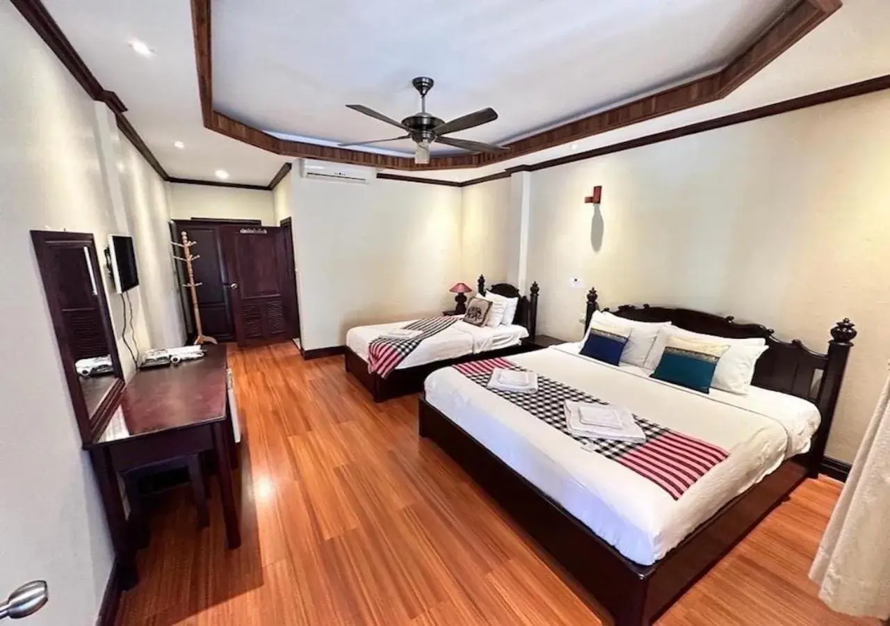 Superior Triple Room in Y Not Lao Villa Superior Triple Room in Y Not Lao Villa