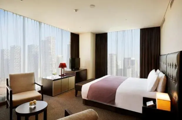 Bed in Orakai Songdo Park Hotel Bed in Orakai Songdo Park Hotel