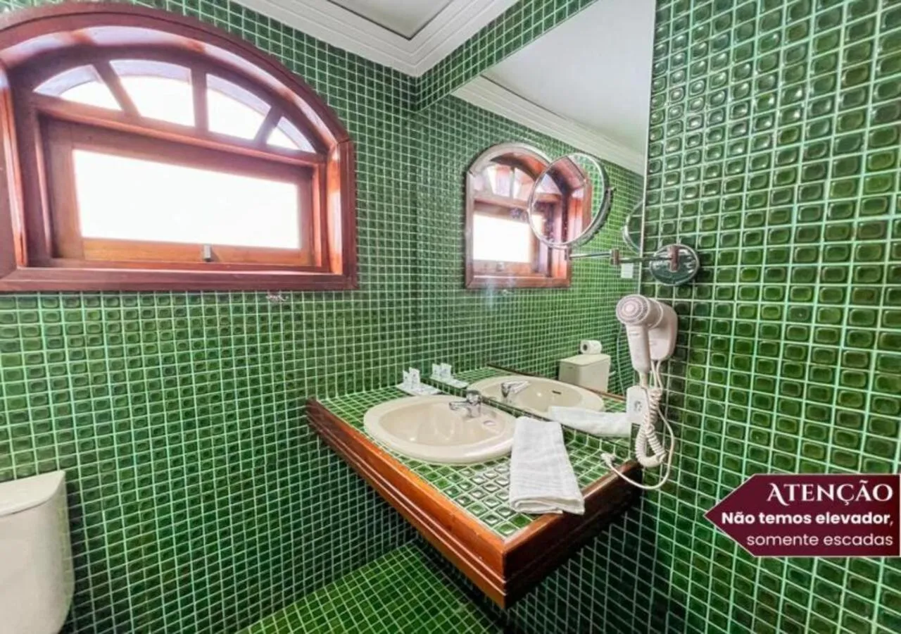 Bathroom in Hotel Euro Suíte Campos do Jordão By Nacional Inn - A 800 metros da Vila Capivari