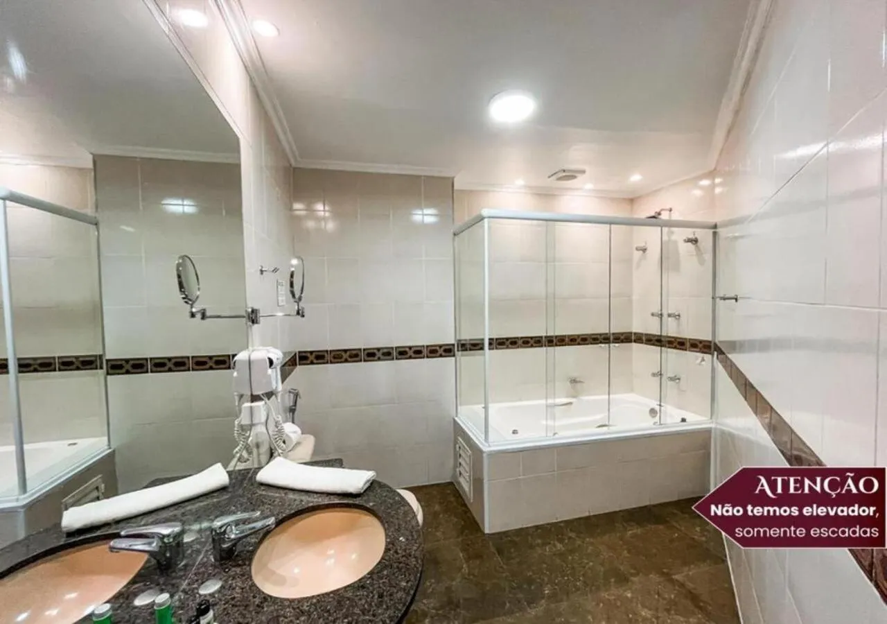 Bathroom in Hotel Euro Suíte Campos do Jordão By Nacional Inn - A 800 metros da Vila Capivari
