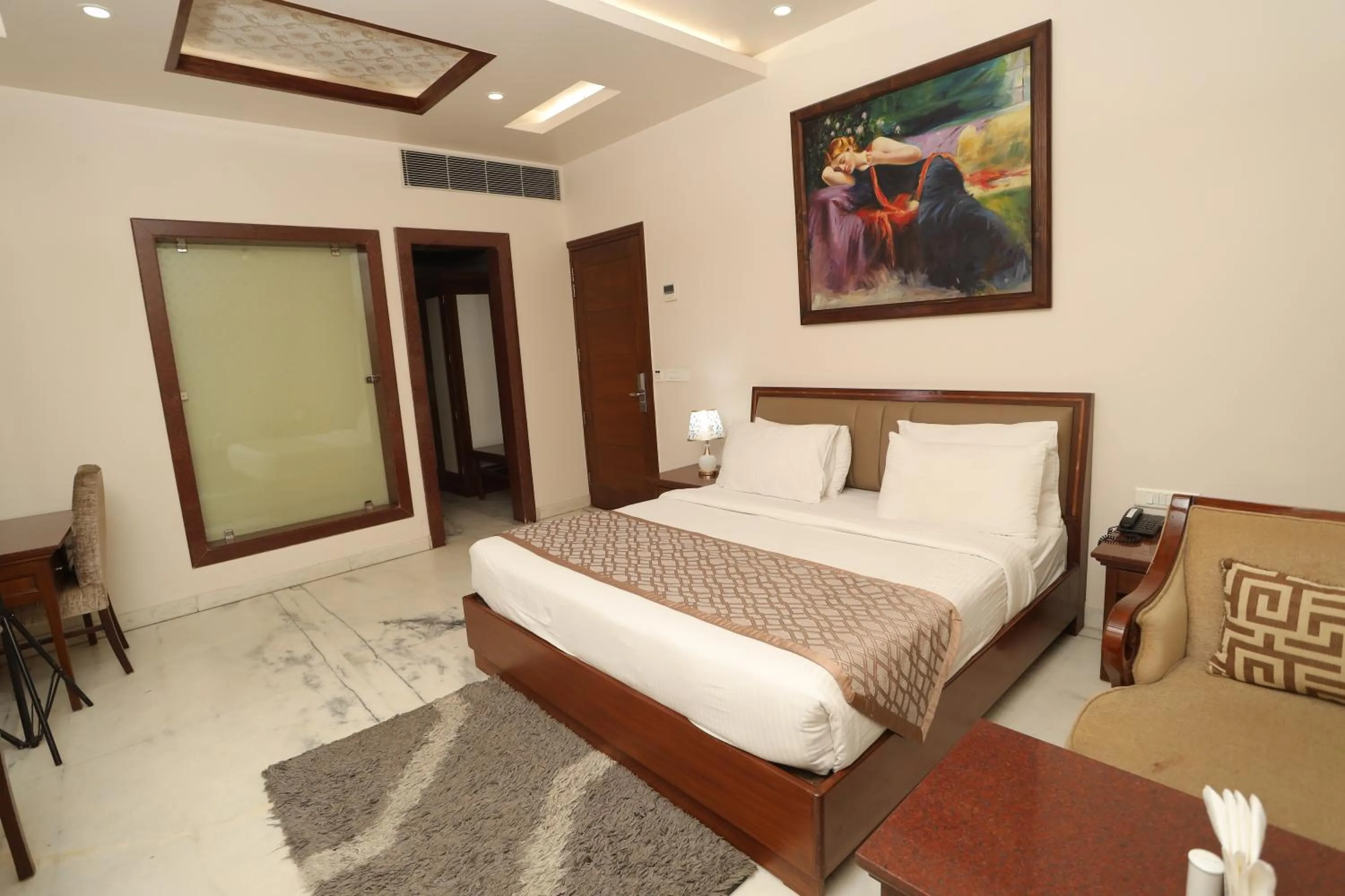 Bed in Hotel Leela Grande