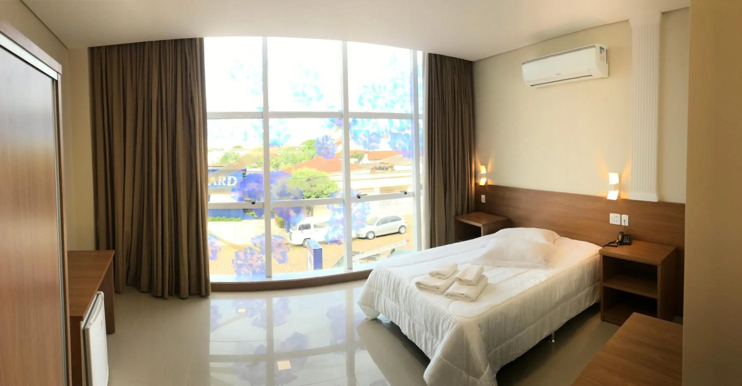 Bed in Ipê Palace Hotel