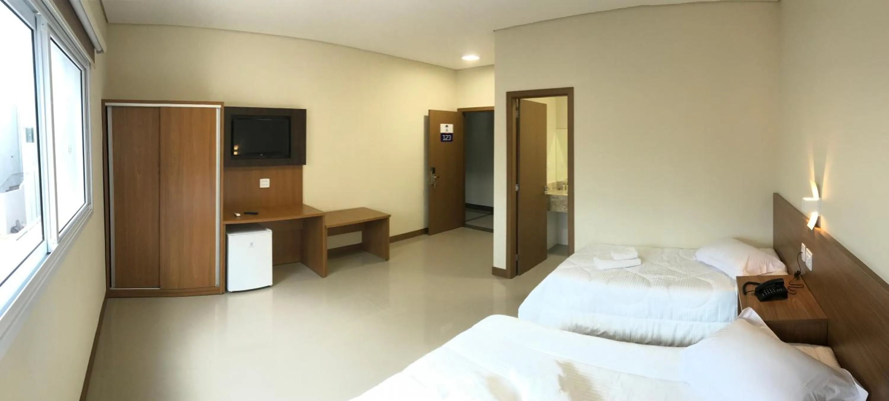 Bed in Ipê Palace Hotel