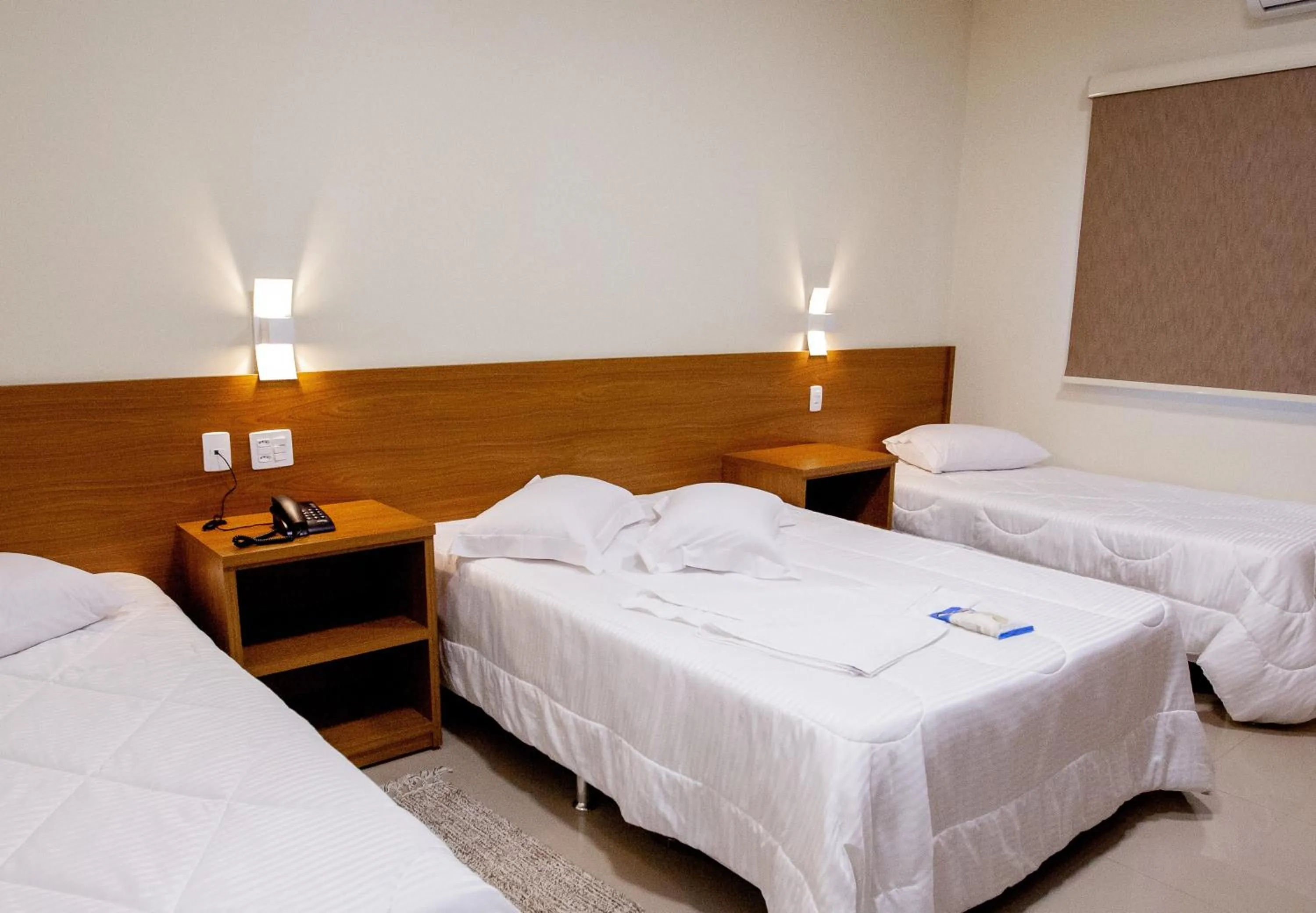 Bed in Ipê Palace Hotel