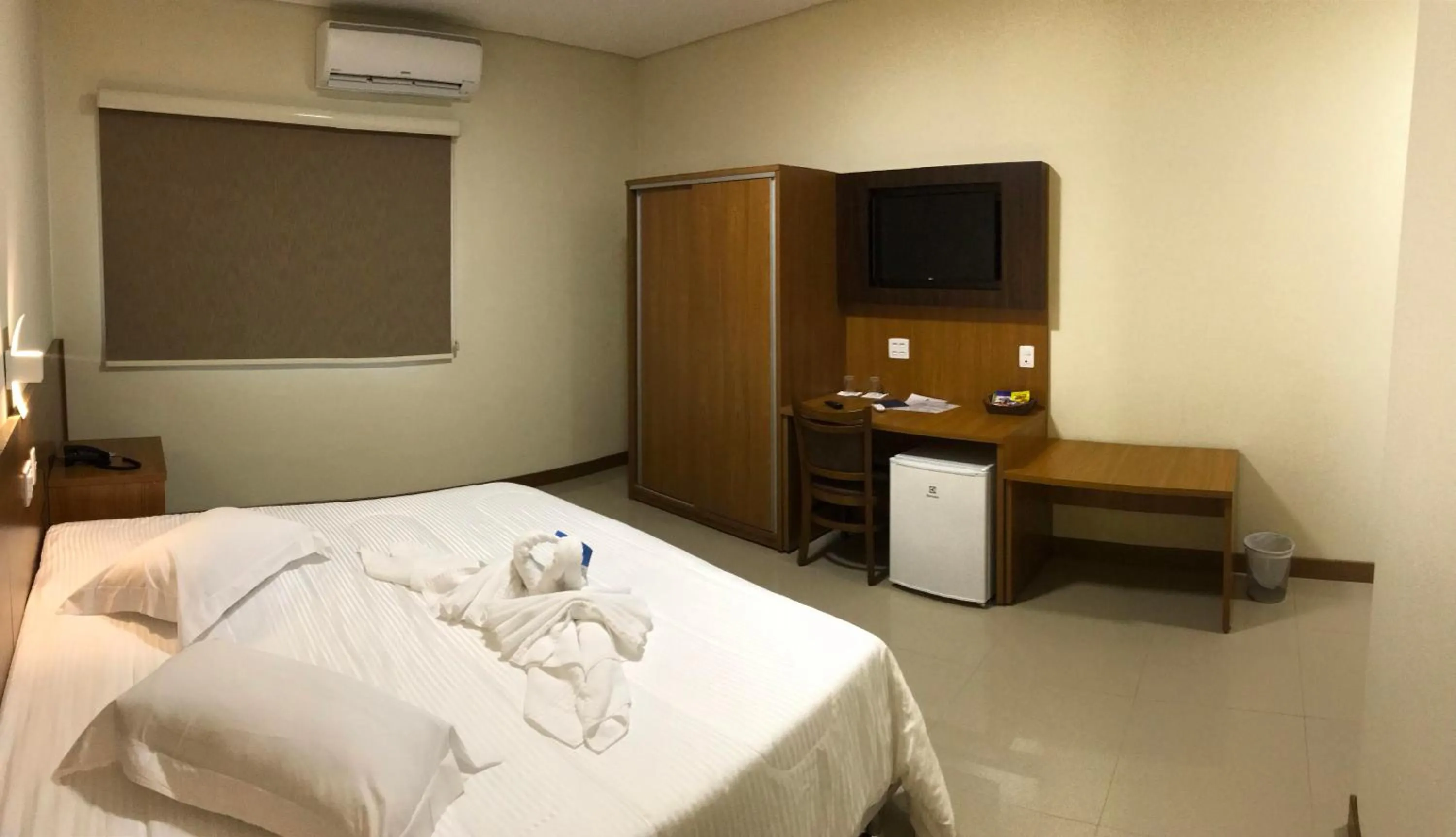 Bed in Ipê Palace Hotel