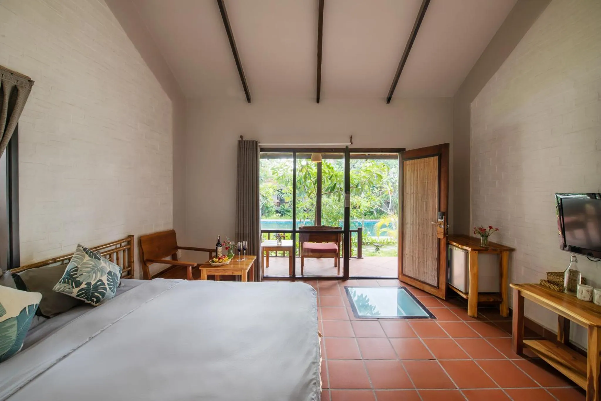 Photo of the whole room, Bed in An Nhien Retreat Phu Quoc with Yoga Daily & Beach access