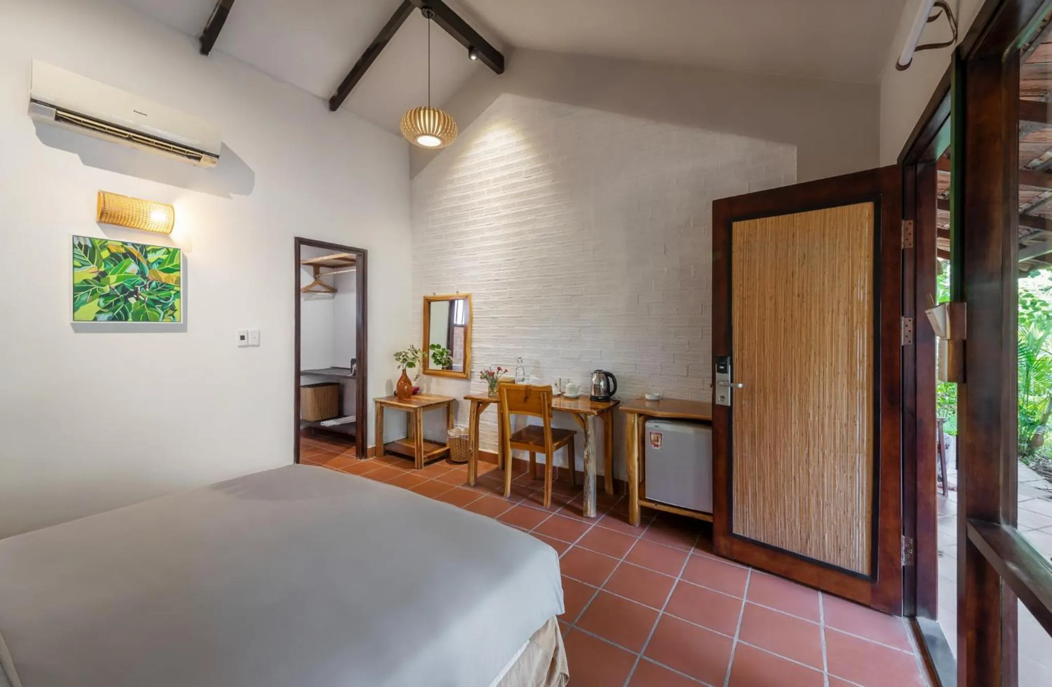 Photo of the whole room, Bed in An Nhien Retreat Phu Quoc with Yoga Daily & Beach access
