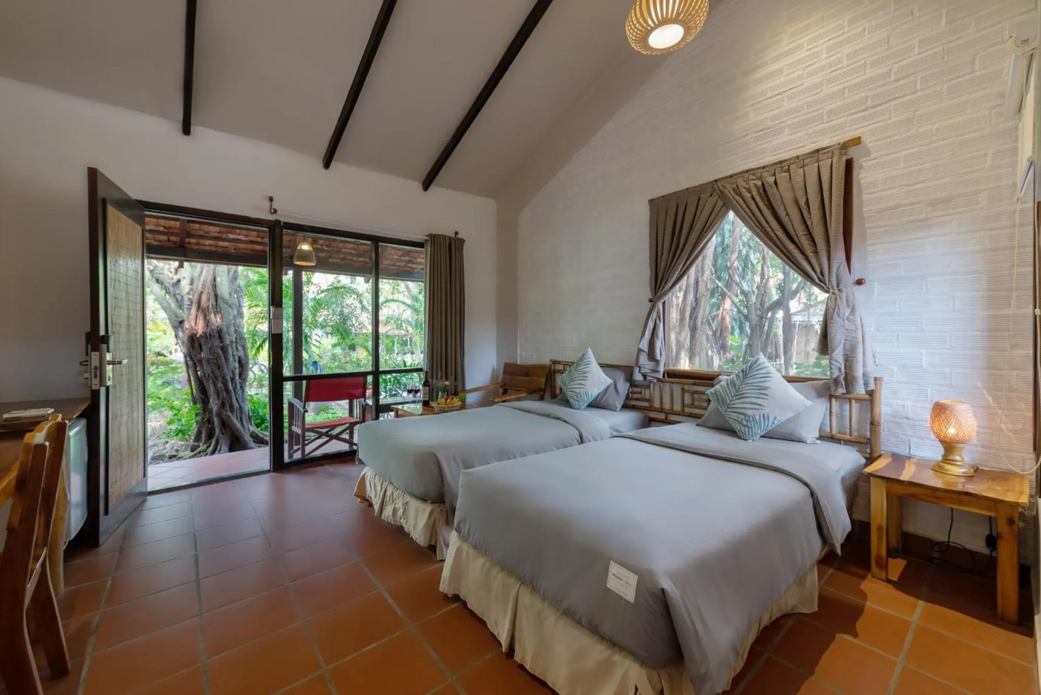 Bed in An Nhien Retreat Phu Quoc with Yoga Daily & Beach access