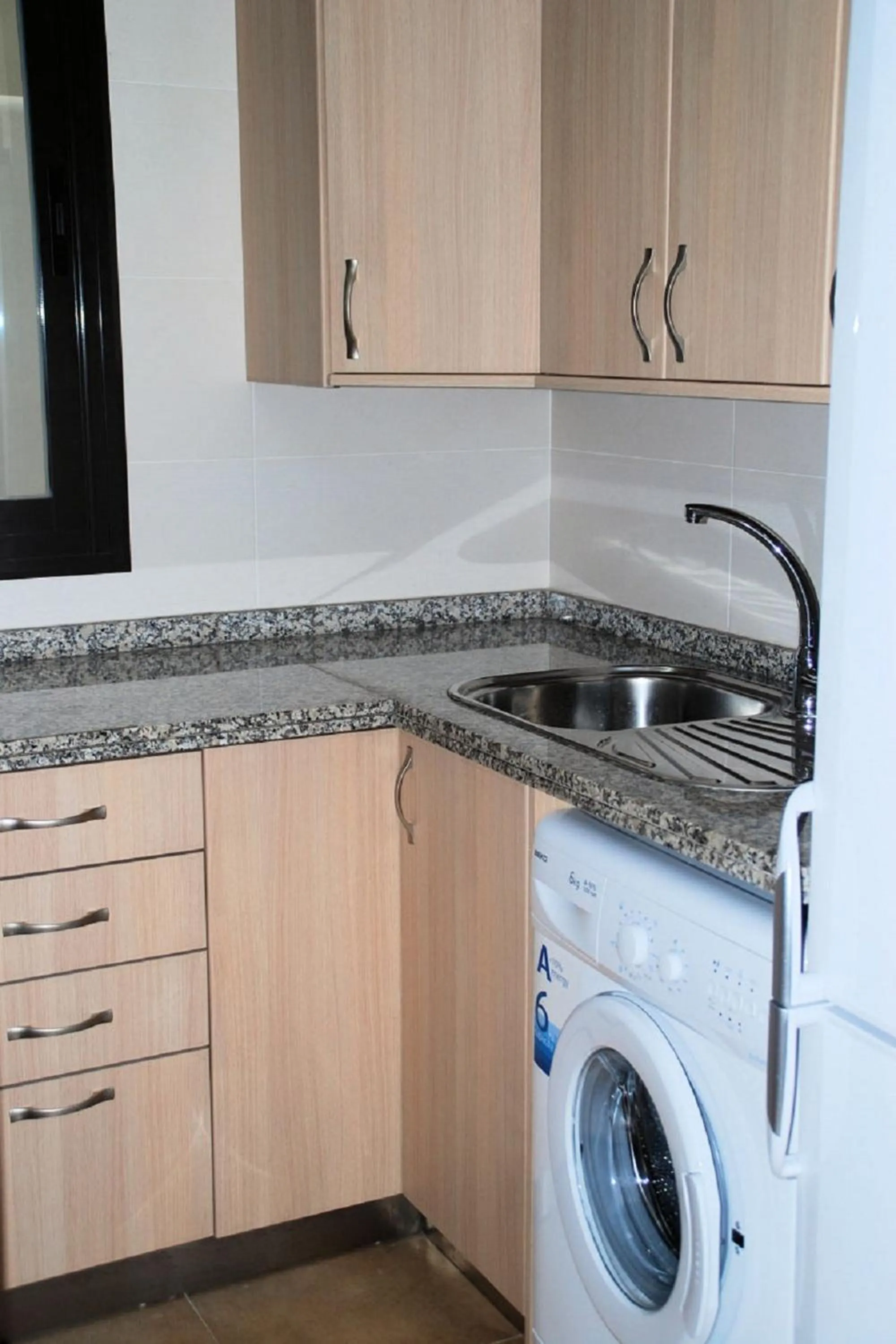Kitchen or kitchenette in Apartamentos Plaza
