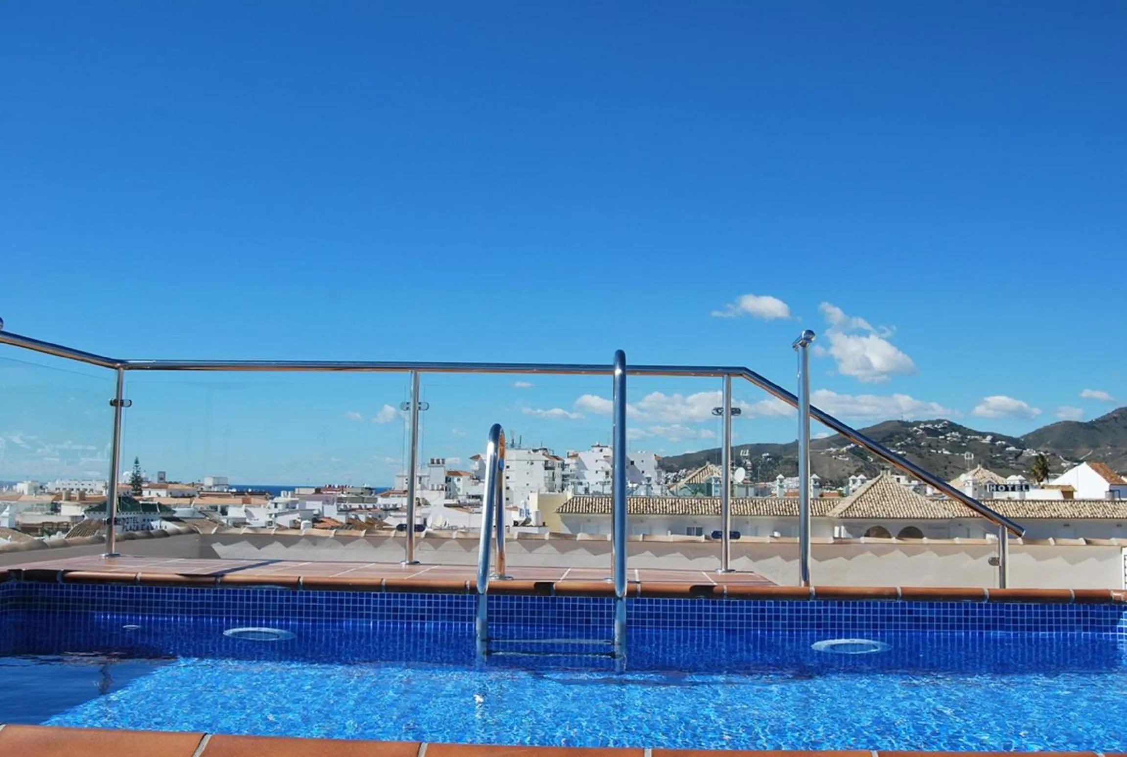 Swimming pool in Apartamentos Plaza