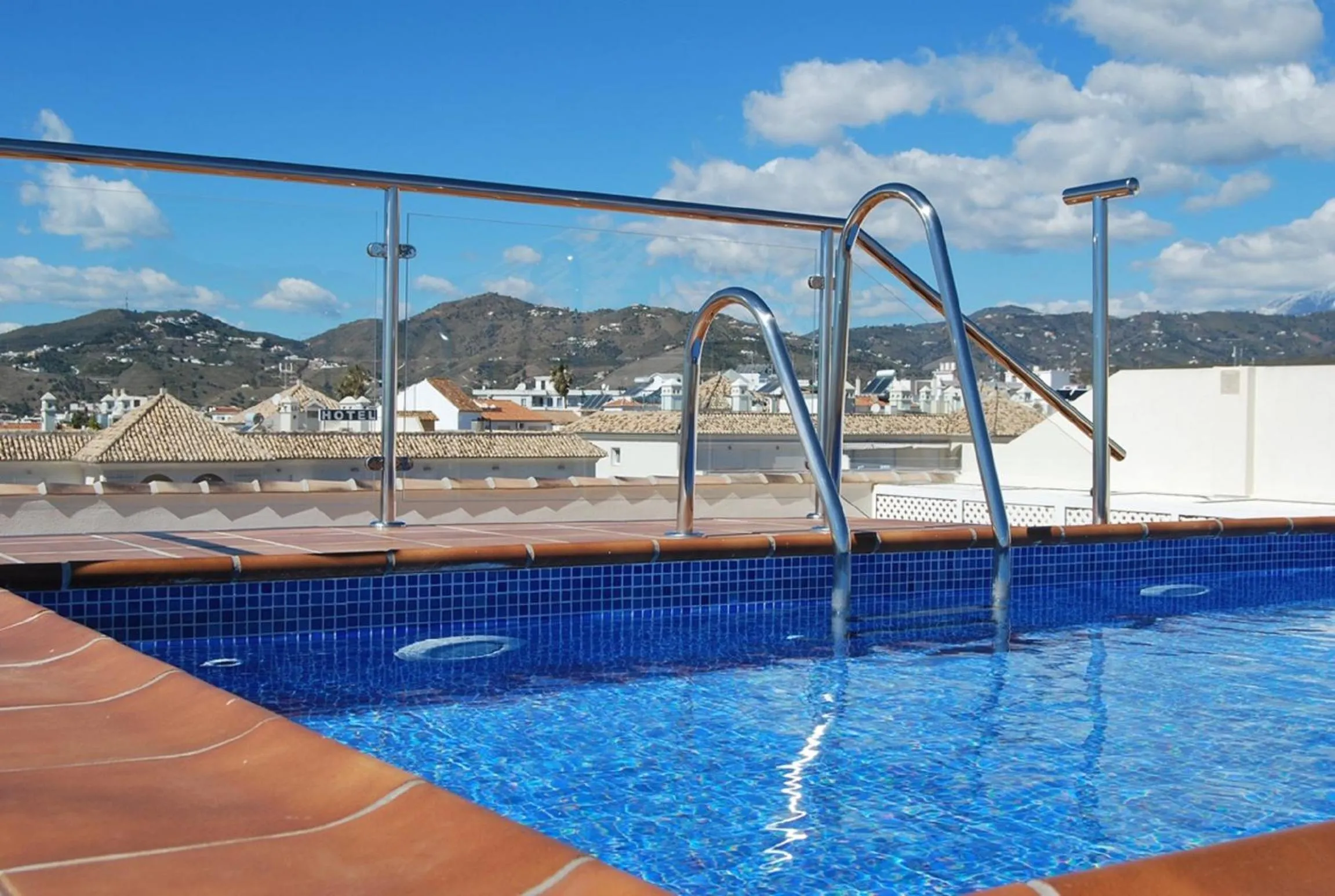 Swimming pool in Apartamentos Plaza