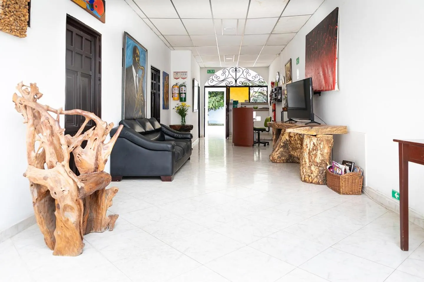 Communal lounge/ TV room in Hotel Ayenda Guadalupe