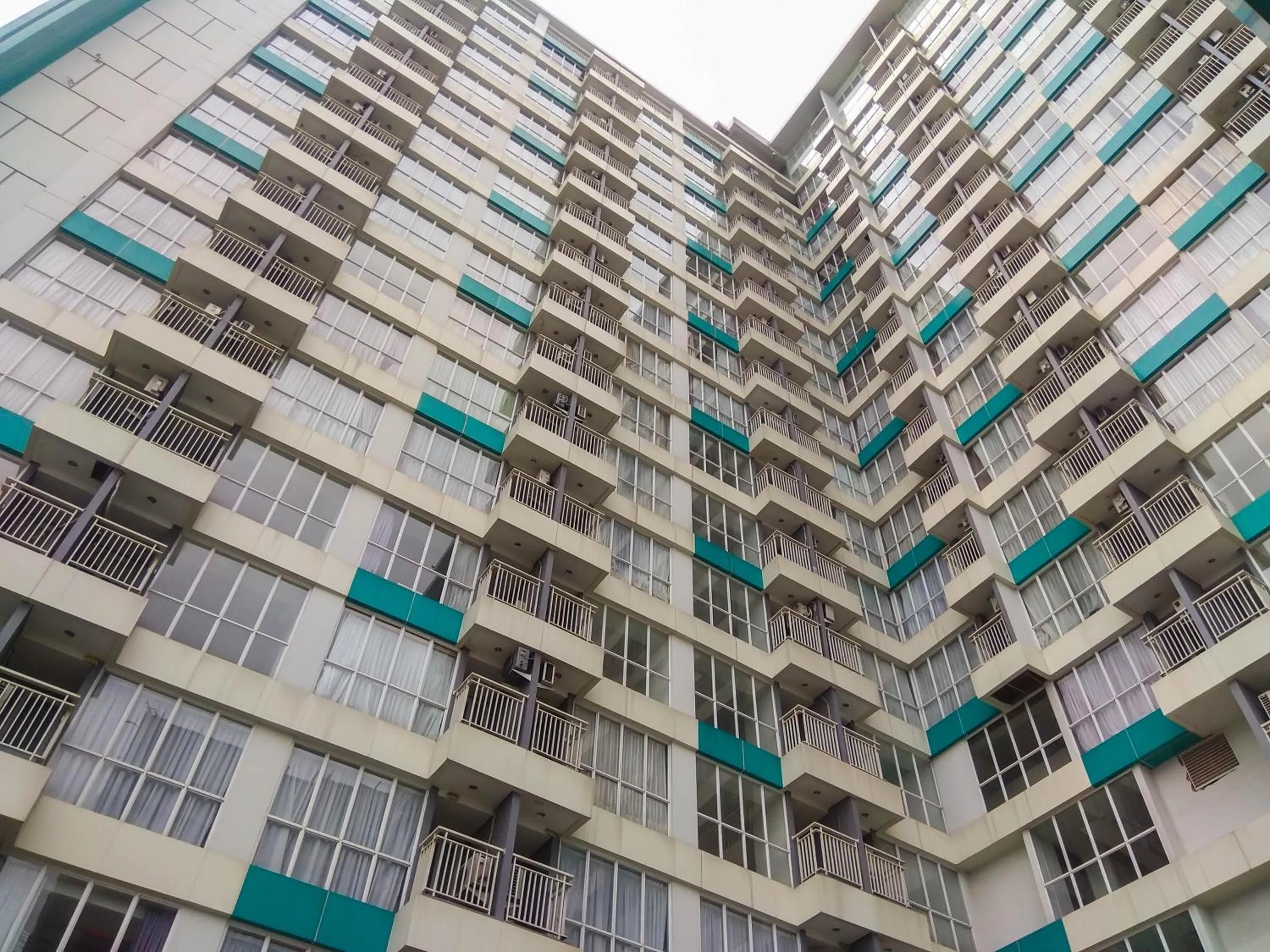 Property building in Modern and Brand New Studio Apartment H Residence By Travelio