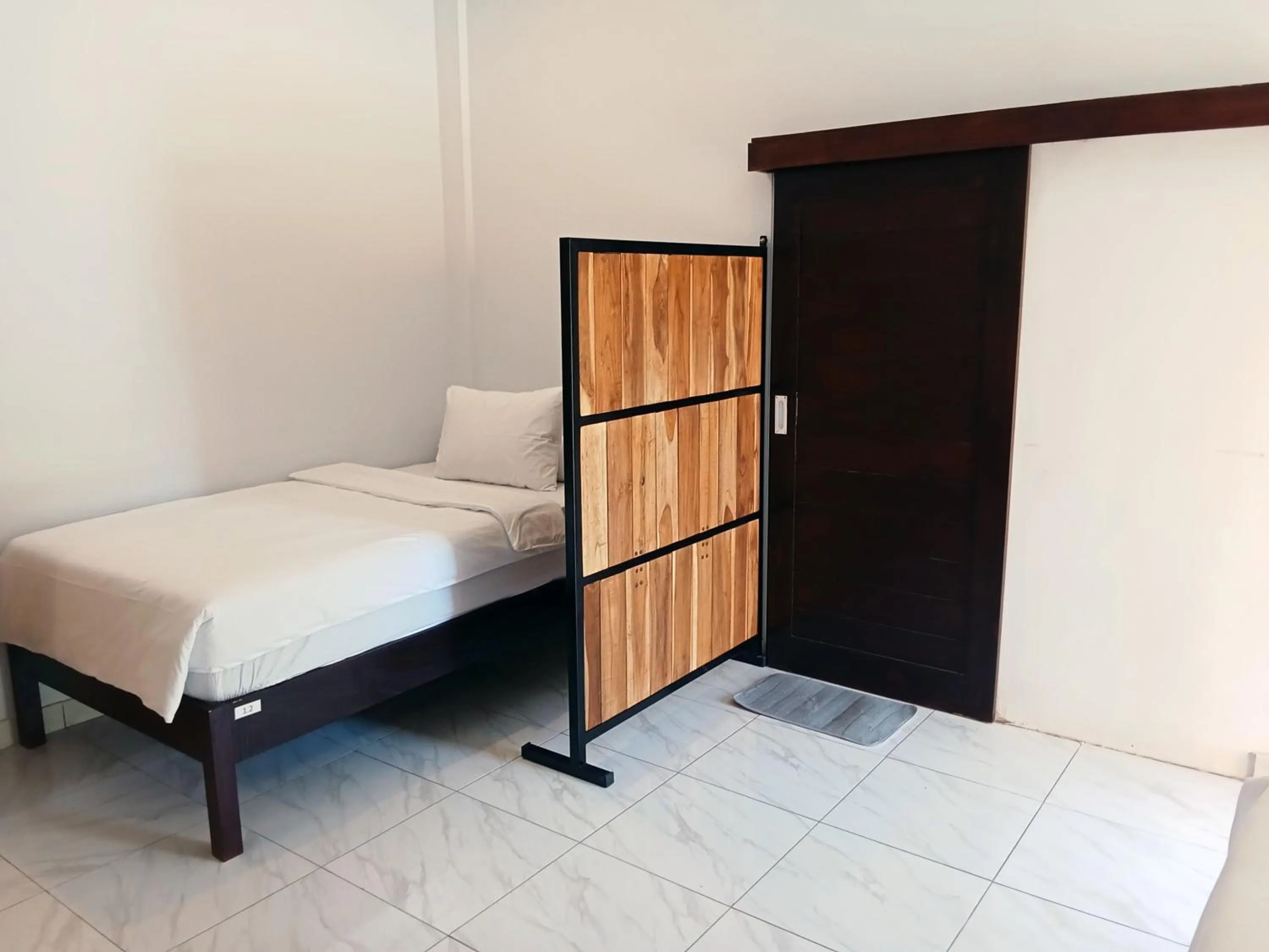 Bed in Scuba Tribe Bali dive-resort